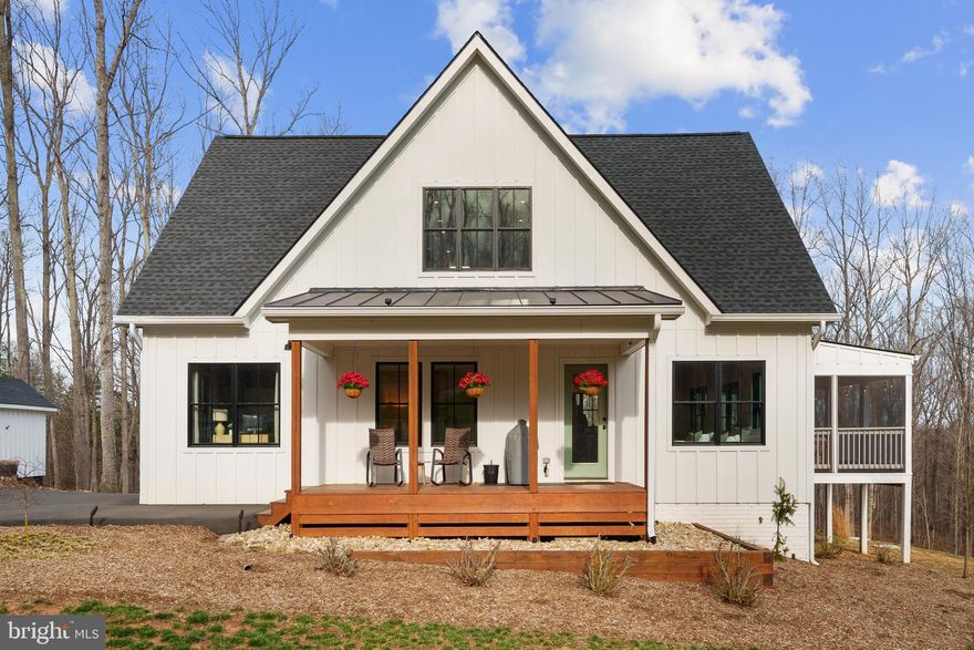 This stunning Modern Farmhouse, nestled on 6 acres, features 5 bedrooms and 3 bathrooms, offering the ultimate private retreat.

As you enter, you are greeted by the charm of shiplap ceilings in the main level, enhanced by Hunter ceiling fans in every bedroom to ensure maximum comfort. Rustic sliding barn doors contribute to the farmhouse vibe, while the open-concept kitchen is a true highlight. It boasts sleek matte black countertops, stainless steel appliances, a Fisher & Paykel induction range, Bosch 800 series dishwasher, and a spacious walk-in pantry. The AquaGuard laminate, tile, and wood flooring seamlessly combine durability with warmth. Step outside to the expansive screened porch off the Great Room or unwind on the inviting front porch.

Upstairs, both bedrooms feature Mitsubishi mini-split cassettes, each with its own thermostat, providing efficient climate control. Notable additions include a ground-mounted solar system, a whole-home water filtration system, a paved driveway, professional landscaping with lighting, extra electrical outlets, a home surge protector, and electric shades in select rooms. Plus, with reliable, transferable Starlink internet, you can stay connected while enjoying the peaceful surroundings. The climate-controlled crawl space offers a whole-house filtration system and provides ample storage. Two sheds are located nearby, with the larger one offering space for a tractor. This property is the perfect sanctuary for those seeking to immerse themselves in nature and escape the hustle and bustle of daily life. Enjoy the cozy outdoor firepit. Explore the numerous trails that start just behind the shed and lead into the woods. With ample space to build a garage, barn, or workshop, the possibilities are endless. Your perfect getaway awaits!