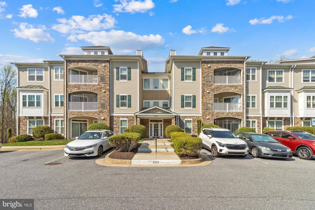 Photo of 305 Wyndham Circle #305 K, OWINGS MILLS, MD 21117 (MLS # MDBC2143800)