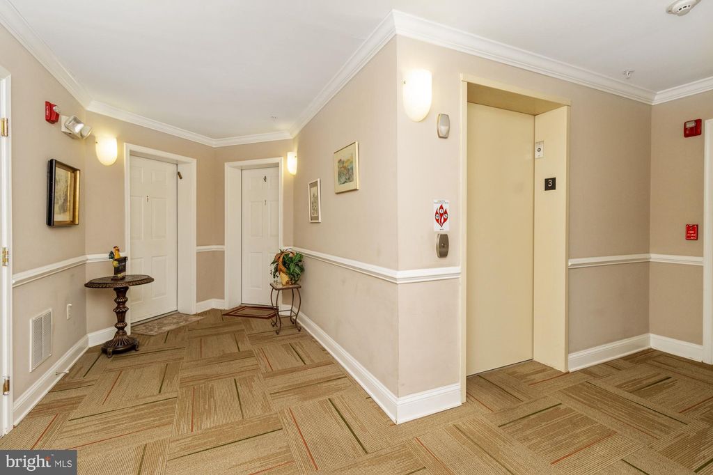 Photo of 305 Wyndham Circle #305 K, OWINGS MILLS, MD 21117 (MLS # MDBC2143800)