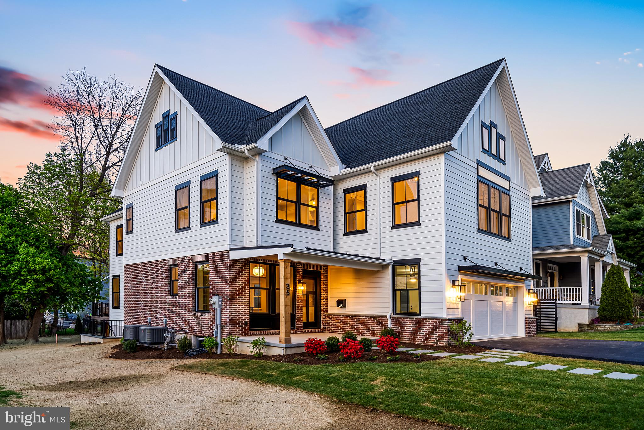 A remarkable renovation and expansion of a previous cape has transformed this property into a bright, stunning 4- bedroom, 3.5-bathroom Industrial-Farmhouse style home. Beautifully designed with stunning appointments throughout, this home reflects custom construction in the contemporary living style discerning buyers have come to demand. Conveniently located within Media Borough, it features all the benefits of urban living plus convenience to the Philadelphia Airport, major interstates and other regional destinations via car, rail, or plane, including New York, Delaware, Maryland, Washington D.C. Within blocks of downtown Media, it allows easy access to amazing restaurants, retail stores, frequent outdoor events and many other interesting venues. Exquisitely constructed by Amish craftsmen, the original home was deconstructed removing the entire 2nd floor, expanding the home at the rear, adding a new 2nd floor and additional lower-level basement and rebuilding entire structure to over 4,000 sq ft w/new materials except for key elements such as removal of the original brick that was cleaned and reinstalled as the gorgeous brick apron seen on the building today. The kitchen area is extremely large w/over 300 sq ft inclusive of 10' customized island w/rift sawn white oak shelving meticulously designed and built to look like custom furniture and a farmhouse sink w/Perrin & Rowe Georgian Bridge kitchen faucet ($2,000+). Custom features include a 48" 7-burner/2 oven, Italian iLve Professional Series gourmet range; Bosch 800 dishwasher; Dacor refrigerator w/reeded doors; GE cafe drawer microwave; Zephyr beverage cooler and an additional Bosch Benchmark oven (in mudroom with quartz countertop). Also featured: solid wood Conestoga custom cabinets w/rift sawn white oak offering a distinctive grain resulting from rift sawn milling; custom white shaker-style cabinets; quartz countertops; floating shelves, deep windowsills and a custom rangehood incorporating white oak flooring harvested from the original home. A custom-built banquette has white oak accents and hand-hammered brass pendant imported from Morocco. The large foyer has custom armoire shelving and seating w/Suzanne Kasler pendant light. Family/dining room has huge custom windows and 470 sq ft of space and includes reclaimed beams from original home and gas fireplace w/custom beam and tile. Sliding family room doors lead to an over 300 sq. ft. TREX deck and walkway for grilling. Entire 1st-level of the house, primary bedroom and 2nd floor hallway are solid white oak 3.5" tongue and groove ‘finished-in-place' wood floors. Large mudroom has powder rm & custom storage & outlets. The 4 bedrooms are large with the smallest one 200 sq. ft. Two have full ensuites w/full baths; All bedrooms offer fully customized walk-in closets w/luxury lighting and storage. Primary bedroom closet has Hubbardston Forge chandelier ($2,500), multiple pull-down devices for storing hanging items, reeded storage drawers, rift-sawn white oak counters & custom mirror. Fontaine Chandelier ($1,300) further enhances the ambiance of this room and Primary bedrm 2nd closet has 8' custom solid wood doors with custom millwork, cabinetry & shelving. Jr. Suite at front of home includes a Mellenium Carruth chandelier ($680). One other front bedroom has 250 sq ft and includes a custom-designed and built window seat w/bookcases and custom lighting. All baths were designed with luxury custom tile and the Primary bath has radiant heated floor, luxury grout & tile design, custom wainscotting, mirrors, lighting, fixtures, an expansive shower w/glass enclosure & bench seat. Basement is designed for multiple uses with 2-tier entertainment areas, a plumbed full bath if buyers wish to add their own design aesthetics to final fixtures and a private office w/large windows. Room sizes/measurements estimates only. Real estate taxes reflective of those at time of listing-may not reflect taxes post-settlement.
