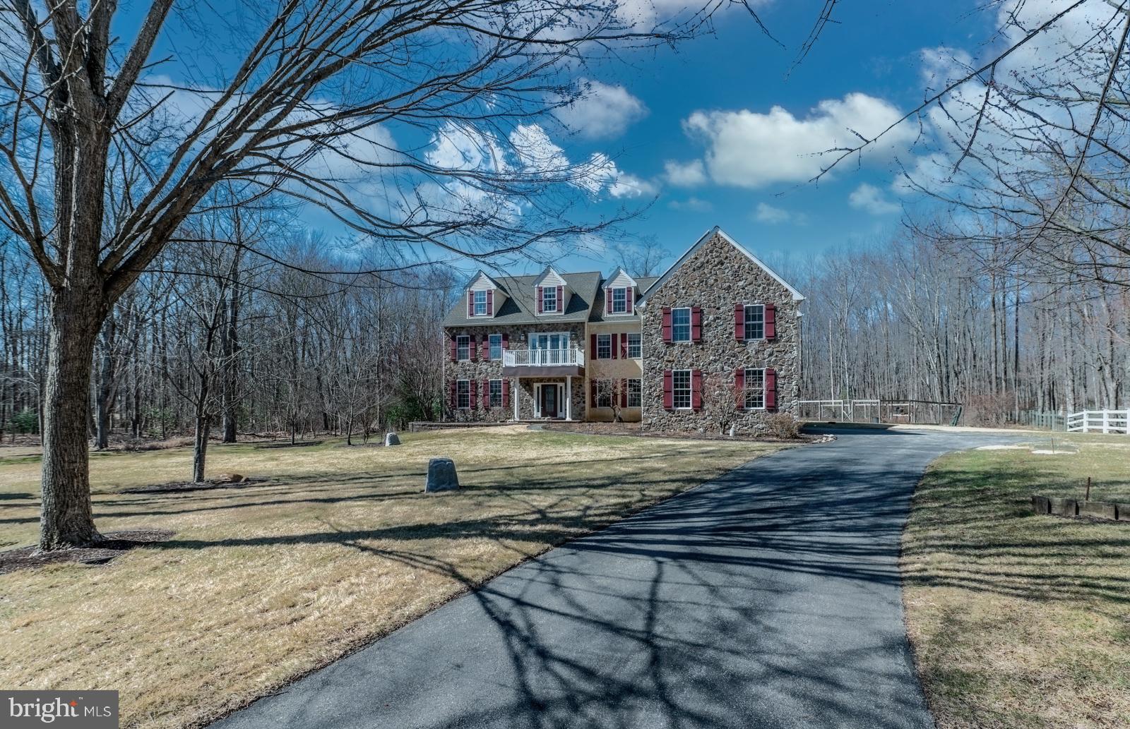 This is the one you have been waiting for in the highly sought after East Goshen Township, West Chester! From the time you enter the cul de sac and drive up the driveway to 1541 King George Ct, you will fall in love with this spectacular property! This lovely home has everything: location, privacy, 3 car garage, fabulous paver patio overlooking the beautiful yard, amazing gardens, 1.46 acres, over 7,000 square feet of functional space and a floor plan that is great for both elegant and casual entertaining along with family life. This gem of a home has 5+ bedrooms, 4 full, 2 half bathrooms and an amazing room above the garage on the second floor. You will be ecstatic when you see how fabulous the spacious and sundrenched third floor is. Additional features include: spectacular views from every window in the house; plenty of hardwoods throughout first floor; 2 story foyer with curved staircase; living room with lovely crown moldings; dining room with tray ceiling and crown molding; office with glass French doors; spacious family room with gas fireplaces; breakfast room with doors leading to the arched paver patio; kitchen with large granite island, electric cooking, custom pantry and lovely tiled backsplash; fabulous mudroom with closet, possible laundry hook up in addition to the laundry room upstairs; 2 half baths complete this first floor. The second floor features: newer carpet; curved hallway with French doors to deck overlooking front yard; primary bedroom suite, two custom walk in closets, primary bath with jetted tub, shower and double sink vanity; two bedrooms with custom closets, jack n jill bath with 2 sinks and a tub shower; guest suite with custom closet and the bathroom has a huge steam shower; amazing sundrenched bonus room over the garage with closets and close to the second staircase to the first floor and spacious laundry room with utility sink. The third floor is fabulous, sundrenched, freshly painted and features numerous windows with window seats, full bathroom with shower, large storage area and incredible space to use as you wish. This home has been well maintained. The systems are updated, Geothermal Heat, 3 units, Well is an Open Loop Geothermal, Public Sewer, Generac for most of the house; solar panels; Roof 2021 and a 100 gallon Propane Tank for the gas fireplace, hot water Recirculator and Generator. It could easily hook into Gas Cooking if you wish. All of this located in East Goshen Township, West Chester Area Schools, close to major roads, train stations, East Goshen Park, Schools, Restaurants in downtown Malvern and West Chester, Golf Courses, shopping and a quick ride to the airport. Welcome home!
