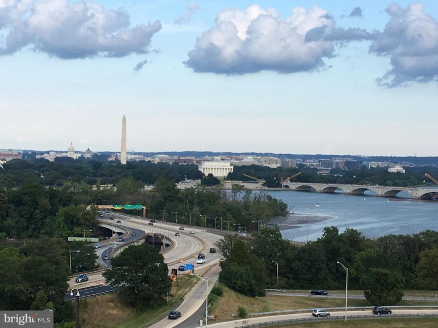 SPECTACULAR PANORAMIC VIEW of Washington Monument, Lincoln Memorial, Capitol Building and Potomac River from your living room window. Largest one bedroom unit in the building.  This furnished 10th floor end unit is to die for.  Spacious-716 sq ft- with balcony for your after-work relaxation.  Great for working at home.   No short term.  Two blocks to Rosslyn metro and minutes to Georgetown, DC, George Washington University.  Basic utilities, community internet and one assigned GARAGE parking space included in rental fee.  No pets and no smoking. Community amenities include a state of the art, renovated gym, swimming pool, tot lot, convenience store, beauty salon/barbershop and NEW coffee shop.