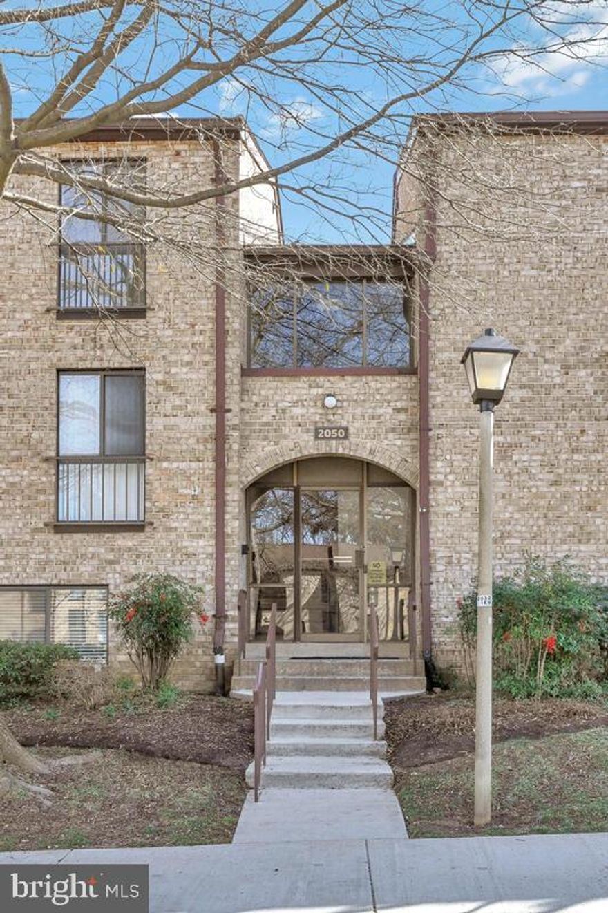 Welcome to the rarely available Southgate - bring your golf clubs !! Spacious condo (860 sq. ft.) in a park like setting.  Entry foyer with expanded coat closet, inviting living room opens to a covered balcony overlooking lush well maintained community grounds. Separate dining room with floor to ceiling window and custom built-ins and cabinet organizers  leads to updated kitchen with custom granite, solid wood cabinets, loads of storage and recessed lighting.  Wood flooring in kitchen, dining room and foyer.  Full size stackable washer/dryer.  Huge bedroom with enormous walk in closet and floor to ceiling windows with tranquil views. Home conveys with an assigned parking space (#183) close to building entrance with ample guest parking also available.  Extra storage space also conveys with the condo. Onsite management, Low condo fees (update- gas and water are covered in fee) and well funded condo reserves round out this super home. Southgate Condos are FHA and VA approved.  A few short blocks to Wegmans, shopping and dining at Reston Town Center and the new Reston Metro.  Easy commute to Tysons, Dulles Airport and D.C. Annual Reston Association dues (approx. $817/yr.) provide access to over 55 miles of walking and riding trails, numerous parks, playgrounds, and more pickle ball and tennis courts than you can visit in a year.  Reston annual membership dues provide for discounted ($35.00 in 2023)  season pool passes at any of the many pools in Reston. Fantastic investment property - Great for first time buyers, empty nester's or an in-town second home .