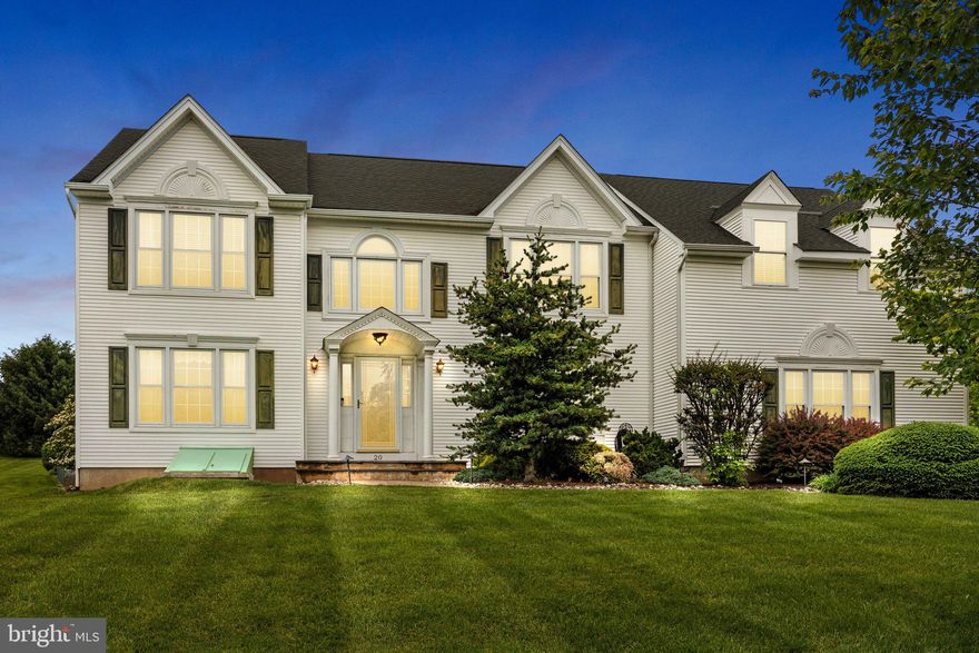 Your next new home awaits; A radiant suburban colonial, nestled in the much desired Holland Ridge neighborhood. This remarkably built home by Trafalgar homes boasts a spectacular lot just shy of an acre, overlooking expansive and well-manicured grass, mature landscaping, and custom exterior lighting.  
 Stepping inside, you’ll be greeted with a double foyer, featuring custom wrought iron railings, solid wood staircase, complete with a retractable electric winch attached to the chandelier for easy maintenance. The updated kitchen showcases solid wood cabinetry, granite countertops, tile flooring, GE stainless steel appliances including a dual-fuel stove offering flexibility for both gas and electric, a refrigerator with a built-in Keurig (Cafe) and a built-in microwave with convection capabilities. Throughout the rest of the first floor, you’ll notice wide plank hardwood flooring, with a step down into the sunken family room, where you’re met with a double-sided view of the gas fireplace into the sun room.  The sun room stuns with a bright and airy feel, allowing for plenty of natural light from 3 sides, vaulted ceiling, and ceramic tile flooring. The sunroom and kitchen exit to a composite deck before stepping down to a large beautiful brick paver patio. The perfect floor plan and setup for both entertaining and privacy.
 
Hardwood flooring escorts you throughout the second floor, revealing 4  large bedrooms, including the primary suite featuring 2 walk-in closets and a dressing area.  The master bath is enhanced to perfection with heated tile flooring, claw foot tub, App controlled shower and a Toto (state of the art bidet).  Accompanying the primary suite is a 700 square-foot addition, designed for truly easy living. This space currently features an office, and is complete with a second-floor laundry room, full bathroom, and sliding doors leading you to the balcony where you’ll find a spiral staircase directly down to the driveway.  The second-floor balcony guides your view to that gorgeous rear landscaping, along with a custom built in-ground pool and spa with waterfall enhancements. Your evenings outdoors are perfectly lit with a lighting package designed to impress.  The pool has been extensively updated; New pool heater and cover (2021), spa coping replacement (2022). 
The attractively finished basement with a built-in bar and new LVP flooring make for a fantastic space for entertaining and relaxation.  The newly installed Bilco doors complete the township compliant basement finishings, and allows the option for walk-out ability.  The large 3-car, side-entry garage, with an epoxy coated floor, satisfies both appeal and function for this gorgeous home. Right in the heart of the prized Council Rock School District, this lovely home is sure to please even the most particular buyer.  
 Open House Sunday July 27th, 2025