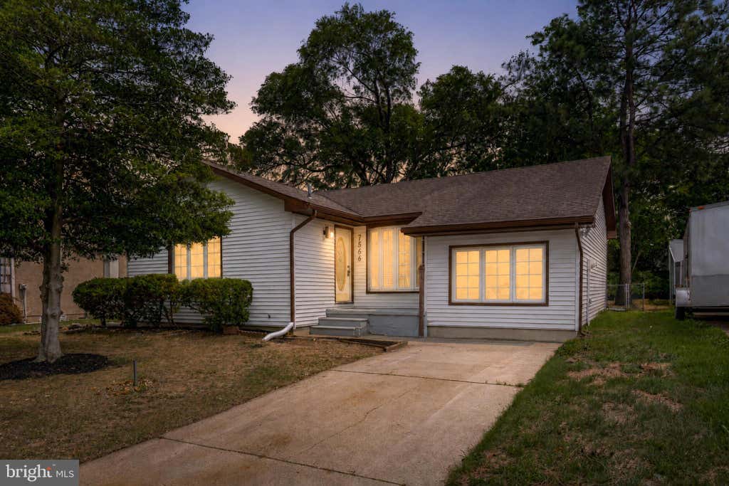 Photo of 7566 Msgr Fallon Drive, PENNSAUKEN, NJ 08109 (MLS # NJCD2122710)