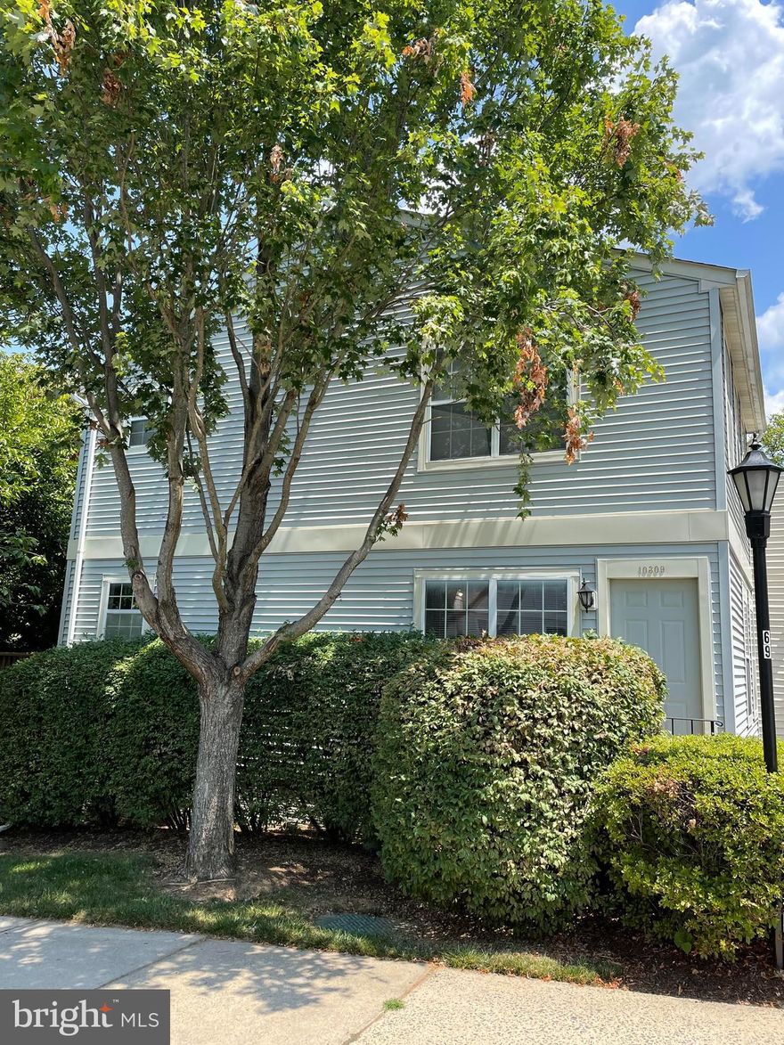 Priced to sell and is being sold strictly AS-IS. Great END UNIT with large deck and fenced in backyard. Needs all cosmetic updating throughout. This is a fantastic project for someone who wants a fixer-upper! Same units in the subdivision have sold between 425-440K.  Primary and secondary bedrooms upstairs each with their own bath. Lower level has a large room with a wood burning fireplace, an additional finished room and a full bath. Could easily be used as a third bedroom as tax records state.  Two parking permits come with the home but there is also plenty of visitor and street parking. Walk to various restaurants, grocery shopping, Walmart, VRE and community pool.