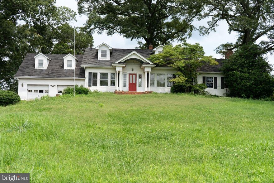 $$ 25,000 price reduction! <BR><BR> Welcome to this picturesque 3.22-acre farmette boasting a timeless Cape Cod home ready for revitalization. With its abundant natural lighting, this property offers a wonderful opportunity to create your ideal retreat.

Originally built as a Sears Catalog Crescent model home, this charming residence showcases its historic roots, complemented by two thoughtfully designed additions. Step inside and be captivated by the sun-soaked interiors, highlighting the home's architectural features.

The spacious living area features a welcoming brick fireplace with/a 6' hearth, perfect for cozy gatherings and creating fond memories. With three bedrooms and three full baths, there is plenty of space to meet your lifestyle needs.

The home's original hardwood floors exude character, while stainless appliances in the kitchen add a modern touch. Enjoy the tranquil ambiance and serene views from the deck, an inviting space for outdoor enjoyment and relaxation.

In addition to the main residence, the property offers a variety of outbuildings, including a 2-stall barn and a 3-stall metal loafing shed, catering to equestrian enthusiasts or those seeking additional storage space.

Discover the charm of outdoor living with an outdoor brick fireplace, perfect for cooking and savoring the beauty of the surrounding nature. The partially fenced yard and spacious pasture provide abundant space for your beloved pets, whether they are charming horses, playful goats, or other cherished animals, allowing them to roam and thrive in a natural environment.

While this property does require some work to bring it back to its full potential, its unique features and peaceful setting make it an enticing opportunity for those with a vision. With a 2-car garage and various outbuildings, you'll have the space and resources to bring your dreams to life.

Embrace the endless possibilities this property presents and unleash your creativity to transform it into your personalized haven. Don't miss the chance to own a piece of history and create a home that reflects your unique style. Schedule a showing today and let your imagination soar!