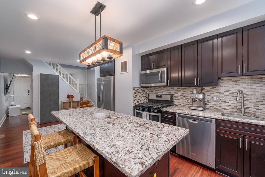 Now offering buyers a $2,500 credit towards an interest rate buy-down OR buyer closing costs!! Visit the Open House on Saturday,  6/14 from 3-4:30pm!  Welcome to 1452 Decatur Street, a beautifully maintained rowhome nestled in a vibrant and sought-after location, and complete with a private hot tub! This charming home also offers two bedrooms, 2 full bathrooms, and a functional layout with lots of natural light throughout. The living and dining areas provide ample room for both entertaining and relaxing, while the updated kitchen features modern appliances and a gorgeous island, perfect for all your culinary needs. Enjoy the private rear patio with a relaxing hot tub - perfect for unwinding or outdoor entertaining. Upstairs, the bedrooms offer comfortable retreats or the perfect space for a home office. The lower level provides great additional space, including a recreation area, an additional full bathroom, laundry, plus storage! Located just a couple blocks from Latrobe Park, this home provides easy access to green space and outdoor activities for all. The neighborhood also boasts a variety of local restaurants, making it a great place to explore. With quick access to the water taxi and I-95, commuting is a breeze! Whether you're a first-time homebuyer or looking for an updated home in a convenient location with ample street parking, 1452 Decatur Street is a fantastic option! Don’t miss your chance to make this charming home your own. Contact us today to schedule a private showing!