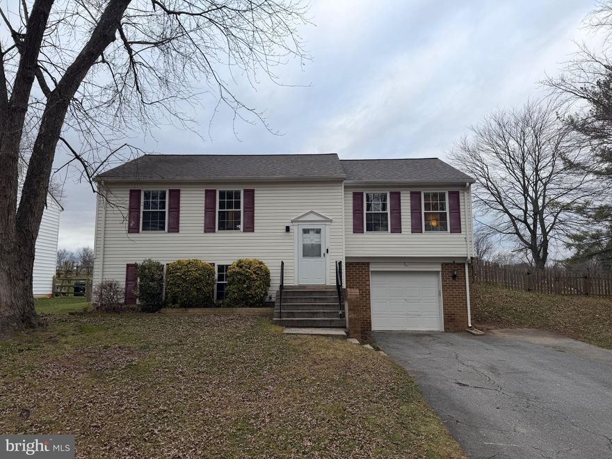 Step into this beautifully updated split-foyer gem nestled on a quiet cul-de-sac in sought-after Walkersville! This charming 3-bedroom home features the flexibility to easily finish a 4th bedroom, along with 2 full baths and an attached garage for added convenience and storage. The bright and inviting main level showcases an updated kitchen with sleek stainless steel appliances, opening to a spacious deck — perfect for outdoor dining, morning coffee, or enjoying warm evenings. Situated on a desirable corner lot, the fully fenced backyard offers fantastic space for play, pets, and entertaining. You’ll love the peaceful neighborhood feel while still being moments from shops, dining, parks, and all the incredible amenities of nearby Frederick, MD. This is a wonderful opportunity to own a move-in ready home in a fantastic location — come fall in love!