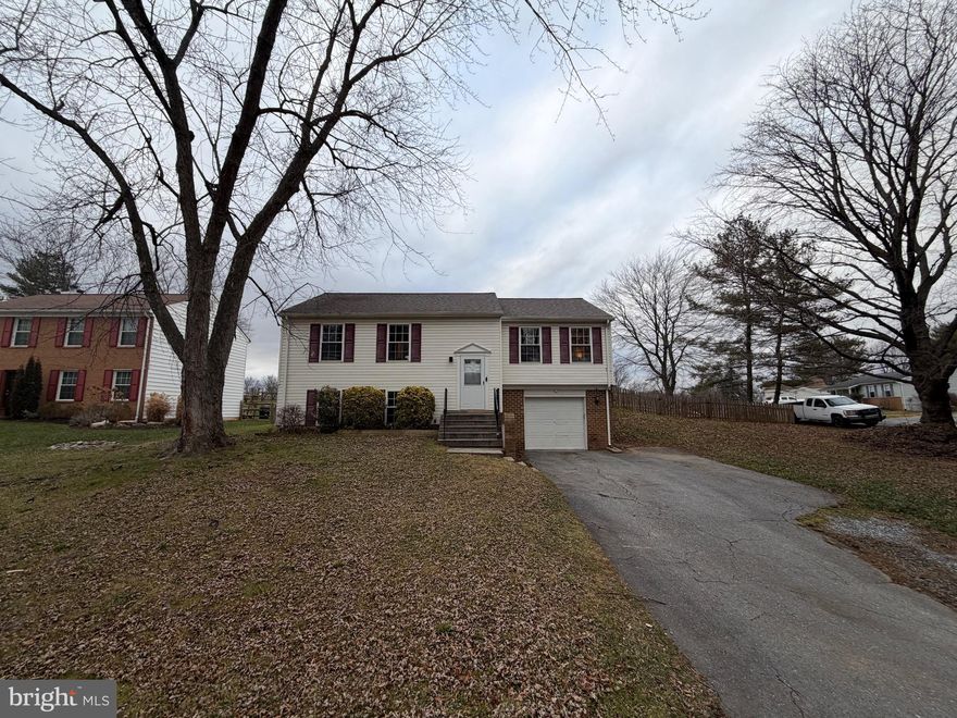 Step into this beautifully updated split-foyer gem nestled on a quiet cul-de-sac in sought-after Walkersville! This charming 3-bedroom home features the flexibility to easily finish a 4th bedroom, along with 2 full baths and an attached garage for added convenience and storage. The bright and inviting main level showcases an updated kitchen with sleek stainless steel appliances, opening to a spacious deck — perfect for outdoor dining, morning coffee, or enjoying warm evenings. Situated on a desirable corner lot, the fully fenced backyard offers fantastic space for play, pets, and entertaining. You’ll love the peaceful neighborhood feel while still being moments from shops, dining, parks, and all the incredible amenities of nearby Frederick, MD. This is a wonderful opportunity to own a move-in ready home in a fantastic location — come fall in love!