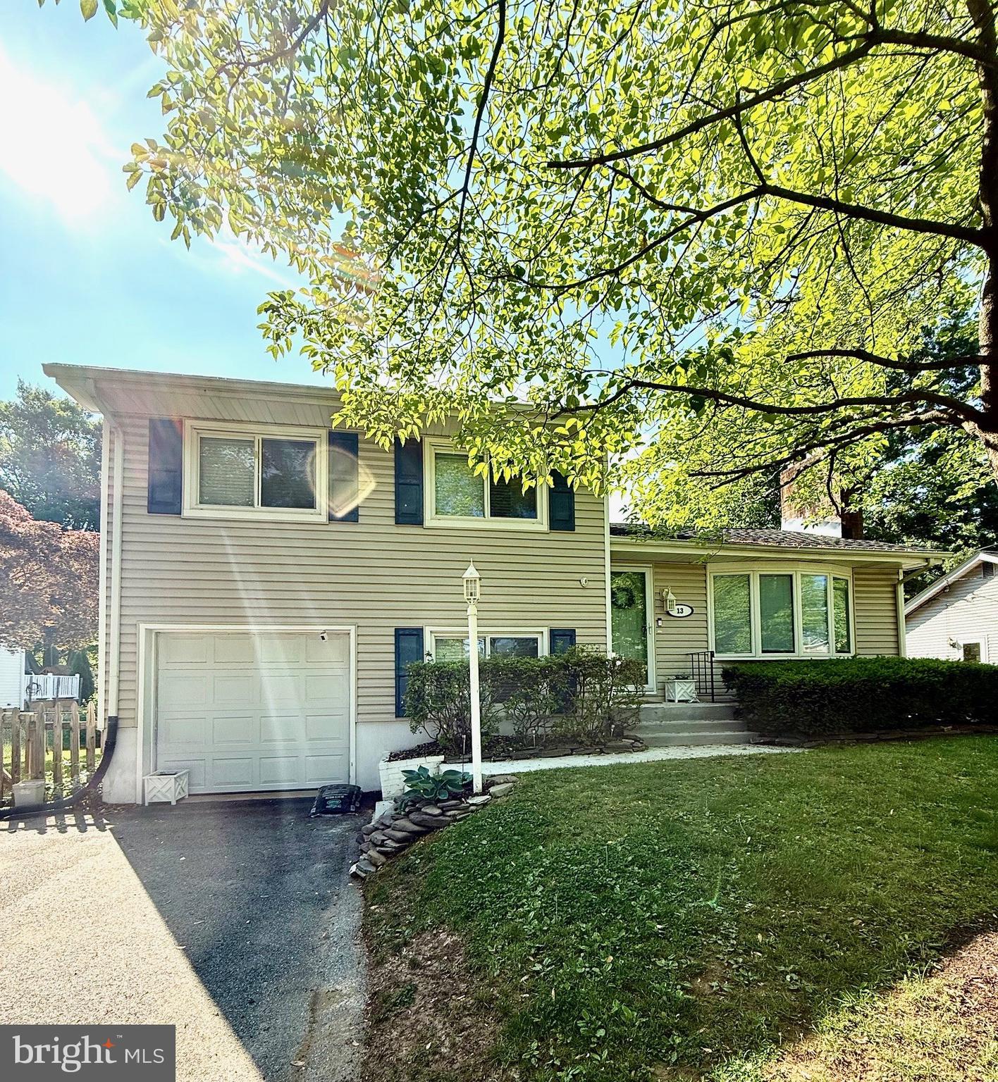 Don't miss this opportunity to get a turn-key home, in a wonderful water oriented community of Admiral Heights! Features include a wood burning fireplace, hardwood floors, open kitchen with breakfast bar, living room, dining room with sliding glass doors to the deck overlooking the fenced backyard, with lots of room to play. Lower level family room, guest bath, laundry room, garage & access to tall concrete floor crawl space for storage and utilities. On the upper level there are hardwood floors, 3 bedrooms and a full bath. Community is near the Navy Stadium, downtown Annapolis, the public library & more! Easy access to all routes of travel, Rt.50, Rt. 97