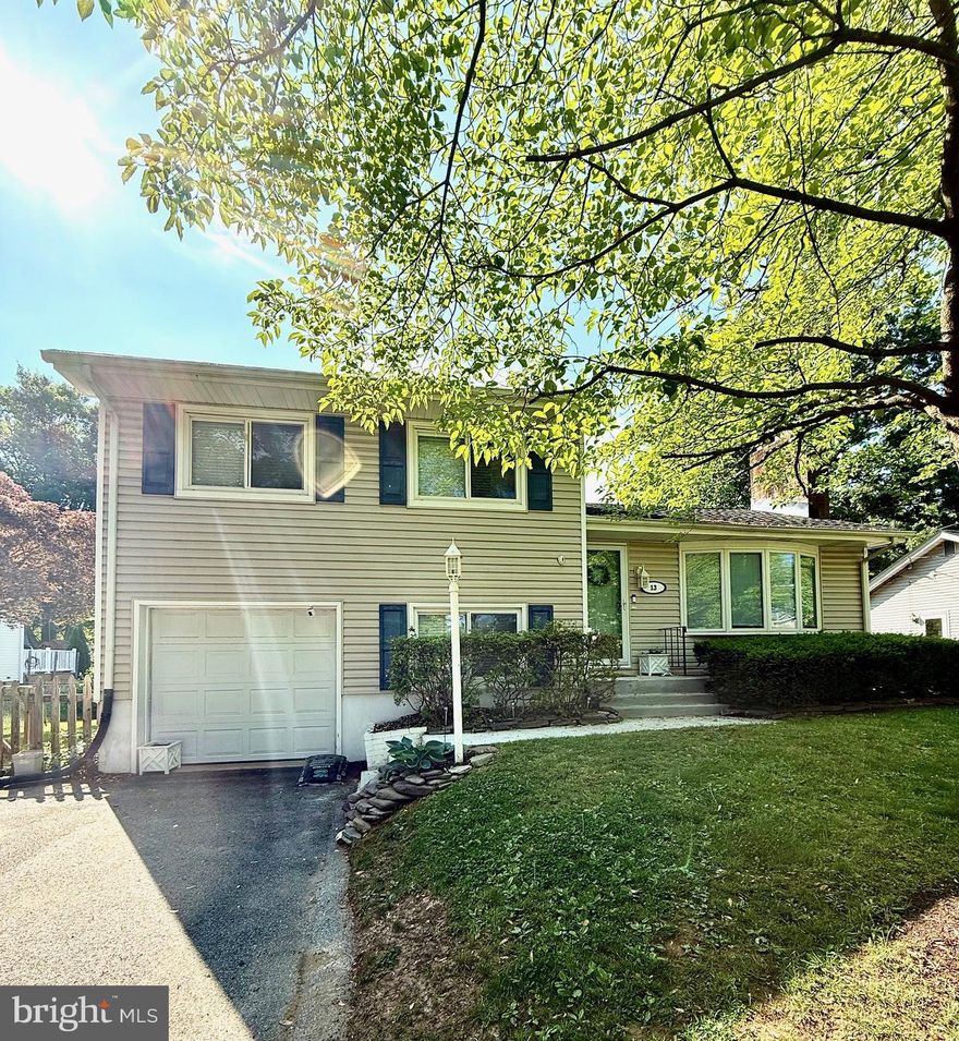 Don't miss this opportunity to get a turn-key home,  in a wonderful water oriented community of Admiral Heights!   Features include a wood burning fireplace, hardwood floors, open kitchen with breakfast bar, living room, dining room with sliding glass doors to the deck overlooking the fenced backyard, with lots of room to play.  Lower level family room, guest bath, laundry room, garage & access to tall concrete floor crawl space for storage and utilities.  On the upper level there are hardwood floors, 3 bedrooms and a full bath.  Community is near the Navy Stadium, downtown Annapolis, the public library & more!  Easy access to all routes of travel, Rt.50, Rt. 97