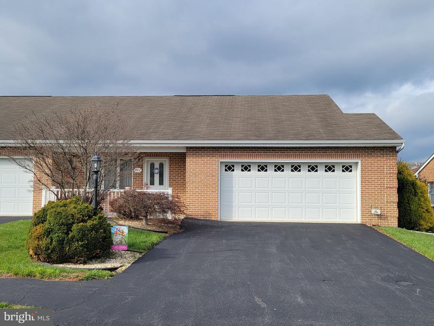 Welcome To Easy Street - End Unit All Brick Townhouse - Double Garage, "Hess" Kitchen, GE Appliances,  Washer/Dryer included, "Andersen" windows, cozy den leads out to lovely covered rear patio, fenced yard & storage shed.   Floored storage above garage.  New "Trane" heat pump about 8 yrs ago.   Awaiting your inspection.