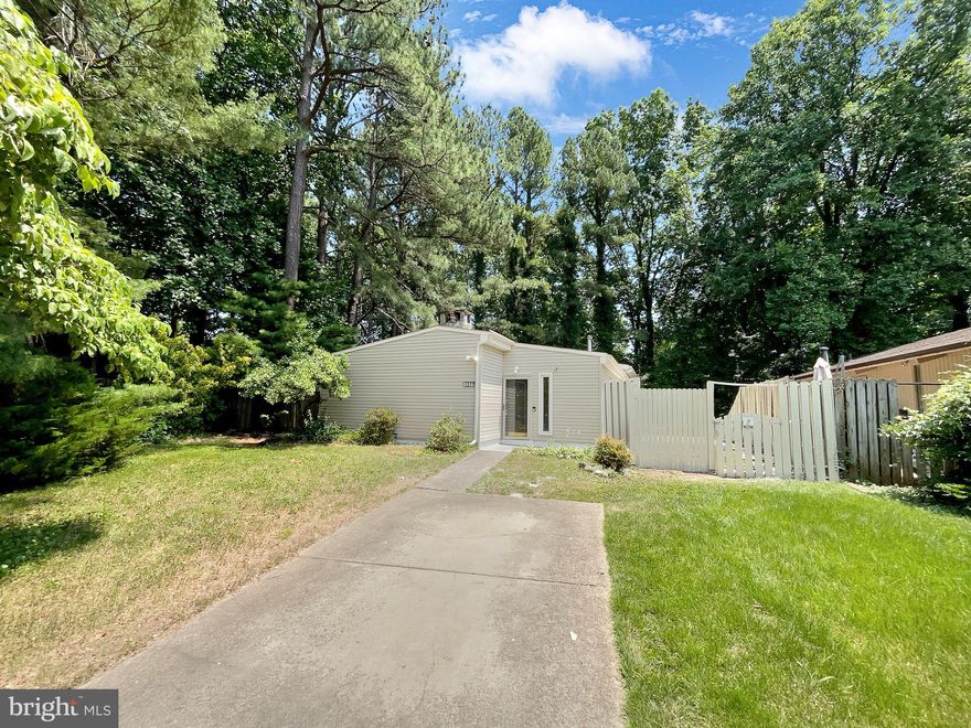 Seller may consider buyer concessions if made in an offer. Welcome to this charming and elegant home, where tranquility meets modern sophistication at every turn. Upon entering, you'll immediately be greeted by the gentle warmth of a classic fireplace, perfectly complementing the sleek neutral color paint scheme that envelops the entire property. At the heart of the home lies the kitchen, a culinary haven adorned with all stainless steel appliances that radiate a magnetic appeal. Step outside onto the inviting deck, where you can bask in the serene outdoor setting. The fenced-in backyard offers a rare blend of privacy and freedom, providing ample room for gardening, relaxation, or private alfresco dining—a versatile oasis right outside your door. Its unique blend of classic charm and modern features promises a harmonious living experience that's simply irresistible. Don't miss out on the opportunity to make this exceptional property your own.