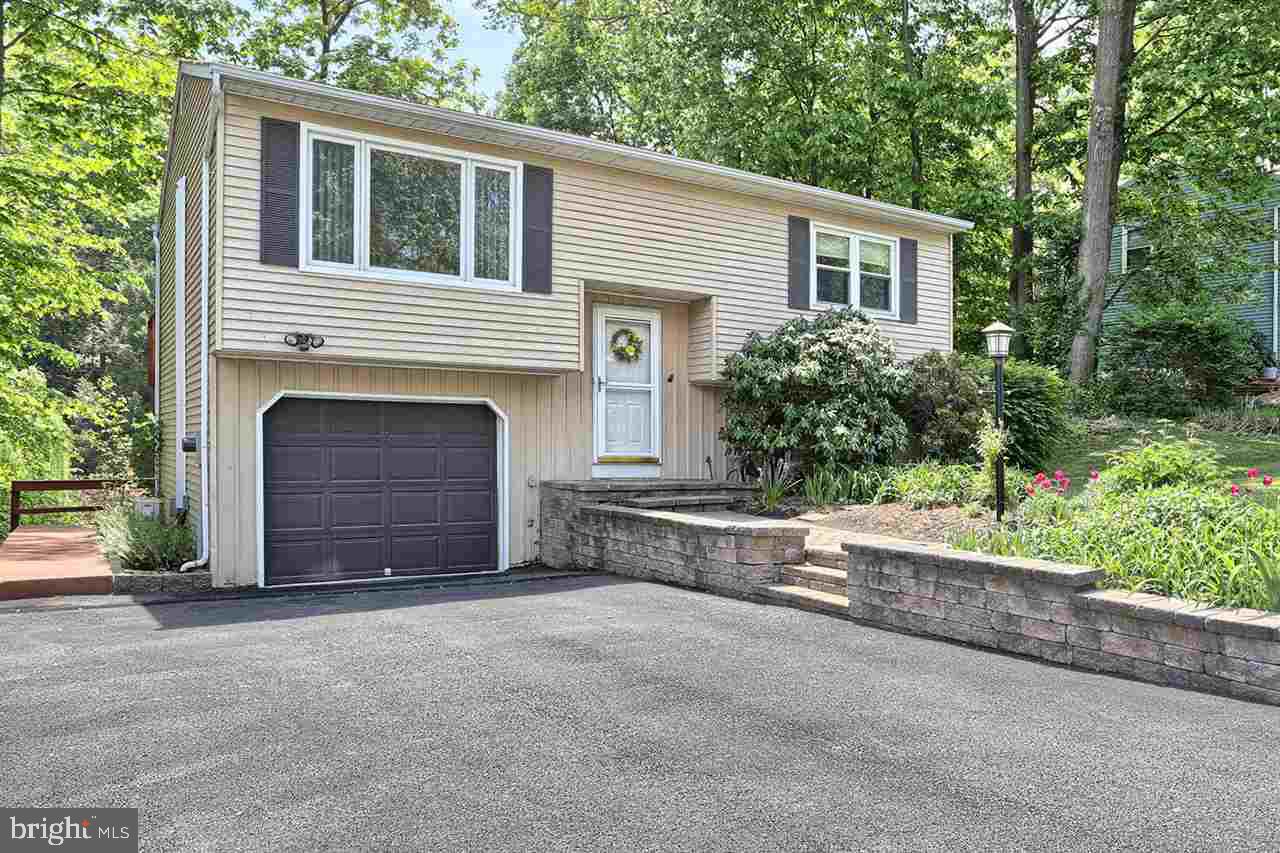 Light and bright, open floor plan on park-like, Fishing Creek creek front lot. 2 bed/1.5 ba. Within walking distance of Valley Green Golf course and club. Spectacular 3 tier deck and 2nd floor balcony overlooking private lot and creek. Spend summer nights at the fire pit by the creek, watch wildlife or fish right in your backyard. Original owner. Garage and mini-split HVAC. Finished Lower level with Family Rm and 1/2 bath.