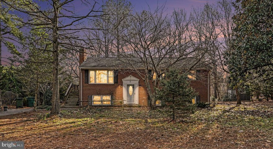 Attention all investors this charming split foyer home  offers a blend of comfort and potential. With 4 bedrooms and 2 full bathrooms, the layout features a traditional floor plan that enhances flow and functionality. The fully finished basement, complete with fireplace, windows and a rear entrance, provides additional living space or a perfect retreat. The kitchen boasts modern appliances, including a dishwasher, microwave, and electric range, seamlessly connecting to the dining area for easy entertaining. Set on a generous 0.69-acre lot, the property is surrounded by mature trees, offering privacy and a serene atmosphere. Outdoor living is enhanced by a spacious deck, ideal for gatherings or quiet relaxation. Additional highlights include hardwood flooring throughout, updated kitchen and ample parking in the driveway. This home presents a unique opportunity to create lasting memories in a desirable neighborhood. Don’t miss out on this gem!