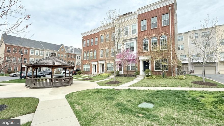 One of the larggest Urban living-  4 level end unit townhouse in the community.  The home is read to move in. The whole house has been freshly painted.  When you walk in, the left side is the Juior Suite,  features a good size bedroom with a half bathroom. Going down the hallway, it will lead you to the garage. Going to the main level, you will get the modern open floor plan kitchen, with large granite counter tops, stainless steel appliances, hardwood floors, power room, and a large sliding door to the deck. Upper level provides you a large master suite with double vanity, shower, second bedroom with a hallway bathroom. Each of your family members will get their own bathroom for the privacy. The top loft area provides an additional bedroom and feature a  entertaining or family room with a full bath. In addtion, you will get the top terrace with wonderful views.  Adjacent to Marc Train. Between DC & Baltimore, Minutes from the new ICC/ 200,95, 495 and 295. Nearby shopping. Next to future Konterra Towne Center.  Community amenities 
 Future on site retail, dining, pool/clubhouse, exercise room, two playgrounds, and more. This is your home.