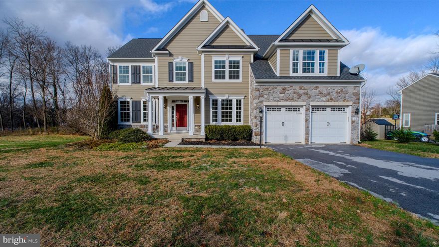 Come tour this fantastic move-in ready home located in Shepherdstown, WV. Boasting 4 bedrooms and 4.5 baths, this property sits on a corner lot with a partially fenced backyard and a new Trex deck. Numerous upgrades include a new upstairs A/C unit, fresh paint throughout all three floors, new basement carpeting, new washer and dryer, and professional landscaping.

The main level features hardwood floors and a dual staircase. A private office is located to the right upon entry, and to the left a spacious den opens into the dining room. The kitchen showcases dark-stained cabinetry, light granite countertops, and stainless steel appliances, including a double oven. The kitchen flows into an open dining area and two-story living room with a stone fireplace and vaulted ceiling. A rear door leads to the Trex deck—ideal for relaxing or entertaining.

Upstairs offers four bedrooms and a laundry room with extra cabinets. The primary suite includes French doors, a massive walk-in closet, and a private bath with dual vanities, soaking tub, and walk-in shower. Bedroom two has its own attached bath, while bedrooms three and four share a Jack and Jill bath.

The finished basement includes a large recreation room with backyard walkout, a full bath, and two unfinished rooms for storage or a home gym. Located in The Point subdivision just three miles from downtown Shepherdstown, this home is convenient to The Club at Cress Creek, Martinsburg, Charles Town, and Harpers Ferry—Best part it's only 80 miles from Washington, D.C. and Baltimore.