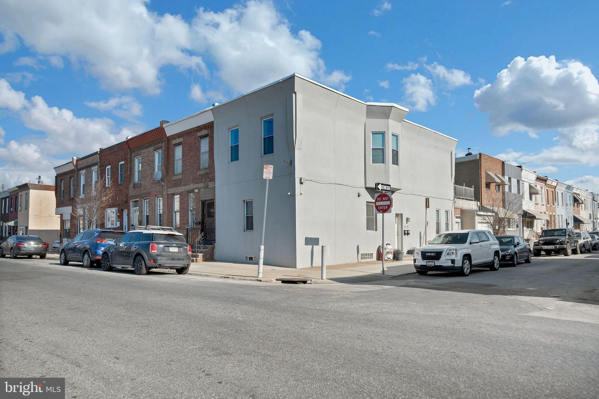 Fantastic Duplex for Sale in Port Richmond! Located on a corner lot with an attached garage, this duplex has been renovated and move in ready. Whether you are an owner occupant looking to have a tenant assist with your mortgage payments or an investor looking for a solid investment, this property is a Gem. The entrance is located on the side with unit 1 on the main floor and unit 2 on the second floor. Both of these units are very spacious and include kitchens/ living areas, 2 bedrooms and 1 bath. The first unit features a good size open eat-in kitchen with new white cabinetry, stainless steel appliances and new flooring. Beside the kitchen is the first bedroom with a platform bed. The second bedroom and bath is down the hall. The bathroom is newly renovated and both bedrooms offer great natural light. The 2nd floor unit is laid out very similar. Large eat-in kitchen and 2 bedrooms with a modern bath. There is also a large walk-in closet/ pantry off the kitchen as well as access to a back deck perfect for relaxing and grilling. This top floor has a stackable washer and dryer and the full basement complete has a washer and dryer and several large bonus rooms. Perfectly located in Port Richmond nearby local restaurants, shopping, transportation and more! Don’t wait! Schedule your showing today!