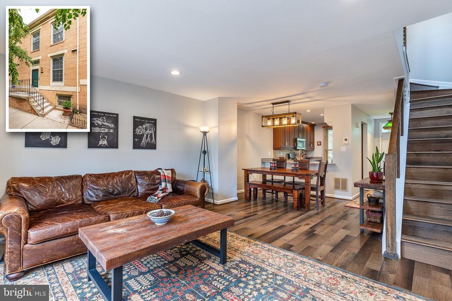 YOU CAN'T BEAT THE LOCATION AND PARKING!! Newer redesigned kitchen with cherry wood cabinets stainless steel appliances and granite countertops. The first floor and second floor have new hardwood floors that really set this house apart. A new open modern staircase was installed last year that makes this townhouse different than any others. Large two bedrooms with the basement either being a finished basement or a bedroom.  This property has a large beautiful backyard that can handle a large outdoor party and does not affect the parking spot in the rear of the home. This is one property that you do not want to miss