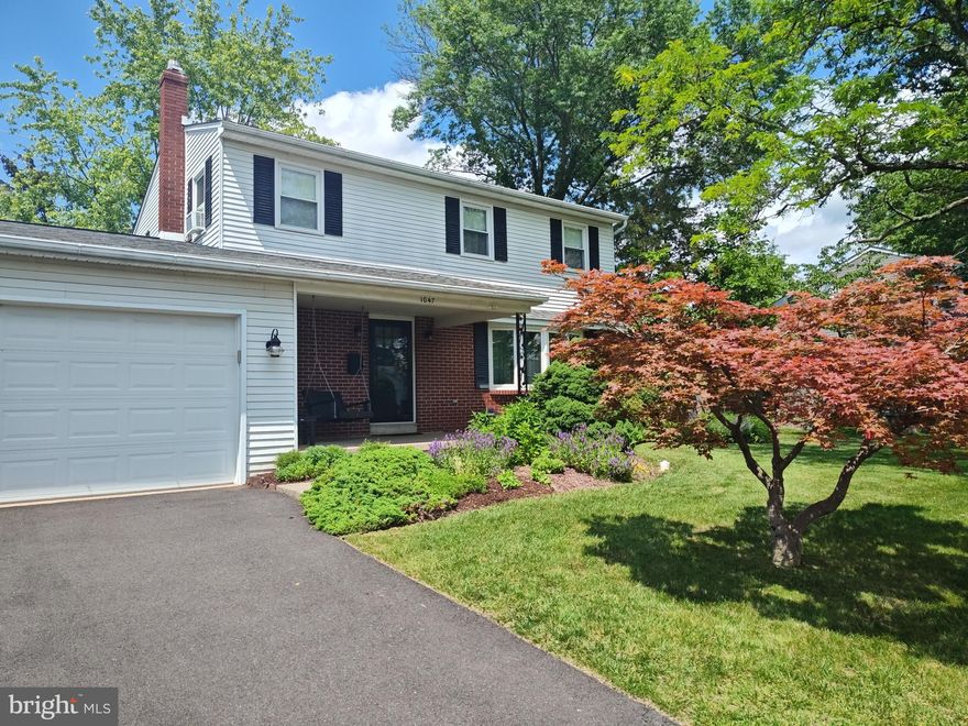 Welcome to this charming and spacious home that offers both comfort and functionality. The main level features a bright living room and an expansive family room—ideal for entertaining or relaxing—highlighted by a cozy gas fireplace and a beautiful bay window. The large eat-in kitchen boasts a flat cooktop, ample counter space, and stainless steel appliances. A formal dining room and convenient half bath complete the first floor. Upstairs, you’ll find four generously sized bedrooms and two full bathrooms—perfect for families of any size. Outside, enjoy a beautifully landscaped backyard that serves as a private oasis in a serene setting. Located within walking distance to the public pool, library, Univest Amphitheater, tennis courts, Quinby’s playground, and local sports fields, this home combines comfort, space, and a prime location.