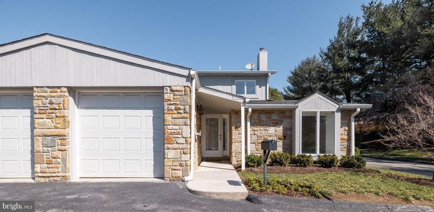 Rarely available in the desirable Chesapeake Stone Manor community! Lowest Condo Fee in the area just $281.00 a month.  Easy Private living close to everything! This charming home features 3 bedrooms and 2 full baths, including a main-level primary suite.  Step inside to a cozy living room with a wood-burning fireplace, seamlessly flowing into the dining area and updated kitchen. The kitchen was completely renovated in 2010, boasting granite countertops, ceramic tile flooring, stainless steel appliances (including 2023 refrigerator), and rich wood cabinetry. The main level also includes a spacious primary bedroom with an ensuite bath, that walks out to private patio.  A convenient main level laundry room. Upstairs, you'll find two additional bedrooms with exposed sub-flooring, ready for your personal flooring choice, along with a full bathroom.  Additional highlights include fresh paint throughout, a one-car garage with a cedar-lined closet, 2016 sliding doors, a brand-new HVAC system installed in 2024, and a new water heater in 2025.  Don't miss your chance to call this home!!