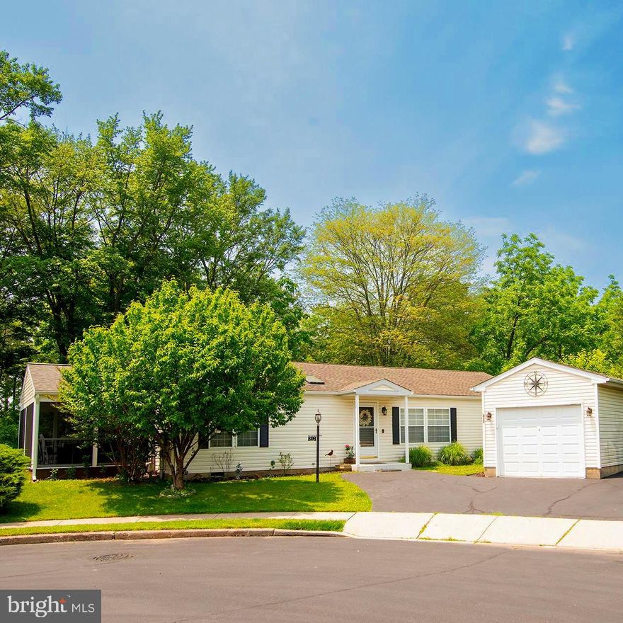 This is the one you’ve been waiting for!  There hasn’t been a home for sale in
this 55+ community for over a year!  NO LAND LEASE!
Welcome to 312 Farm Lane, located in the highly sought-after Gwynedd Woods 55+ Community. This beautifully updated and meticulously kept home is located in quite possibly the most private section of this community, offering peace, tranquility, and an abundance of natural light throughout. The front door opens into the main living area of the house that has an open floor plan to the dining room. The main bedroom is to the right of the living room featuring a large walk-in closet and an adjoining updated full
bathroom. The charming remodeled kitchen has new cabinets, granite countertops, stove, dishwasher, and a kitchen peninsula, offering extra seating and plenty of storage. The large sink has a window view of the
wooded backyard. Conveniently adjacent to the kitchen is a laundry room providing plenty of workspace and extra storage. Next to the dining room is a family room with direct access to the screened and covered deck/sunroom. This additional 220 sq ft of space is a beautiful retreat, complete with Trex decking and vaulted ceiling. The 2nd bedroom is located privately on the other side of the home, along with another updated full second bathroom.  
Don’t miss the detached garage outside, in addition to the home backing up
right to the woods, a secluded wooded area…such a beautiful oasis of a yard!
Highlights of this home include: 
Both bathrooms were updated in 2022
The kitchen was remodeled in 2022
The screened deck/sunroom was added in August of 2023
The entire interior of the home was freshly painted in 2022
New flooring throughout the home (2022) 
New garage roof (2023) 
New gutters/downspouts (2023)
This house just needs you to move right in!  There is no land lease in this community, and the HOA is under $200/month! The association fee covers trash/recycling, snow removal (roads, sidewalks, and driveway apron), and sewer.  It also includes use of the clubhouse, which offers many activities throughout the year for the residents of this community.
Schedule your showing today!  
**ADDITIONAL photos to be added by Thursday**