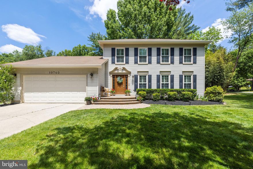 Welcome to this classic colonial situated on a large corner lot only minutes from 355, I-270, shopping, dining, and so much more!  Enter the wide foyer where you are welcomed by the tastefully appointed formal living room with plantation shutters and a 360 view of outdoor greenery. The living room leads into an open kitchen with updated granite counters and center island, hardwood cabinetry, stainless steel appliances, double oven, and main floor laundry with recently installed energy efficient washer and dryer. Enjoy your morning coffee in the wide bay window overlooking the updated deck and private backyard. 

The kitchen leads into a step down family room illuminated by skylights and an original fireplace with electric insert. If you feel like grilling or just enjoying the serenity of the community, step out to your large composite deck via a sliding door and sip a cup of coffee, or invite your family and friends to come enjoy the very private wooded view. 

The updated guest half bath on the main floor features granite counters, updated light fixtures and hardwood cabinetry. Other recent renovations to the home (2019) include new hardwood floors throughout the main level and upper level hallway, updated light fixtures in the main level and door hardware throughout. 

The primary bedroom with a double door entry boasts plenty of space for a king size bed, nightstands, dressers and/or drawers with side walkways and floor space in addition to a walk-in closet. The fully updated en-suite bathroom features polished marble countertops, double bowls, soaking tub with tile accents and a large shower stall, tiled, floor to ceiling with bench, nook and decorative accent strip. 

Don’t forget about the man cave in the basement, perfect for football games, darts, or pool.  There’s a bonus room in the corner and plenty of guilt free unfinished storage.  This home has only seen two owners, and has been lovingly cared for and maintained.  Come see it right away, it won’t last long!