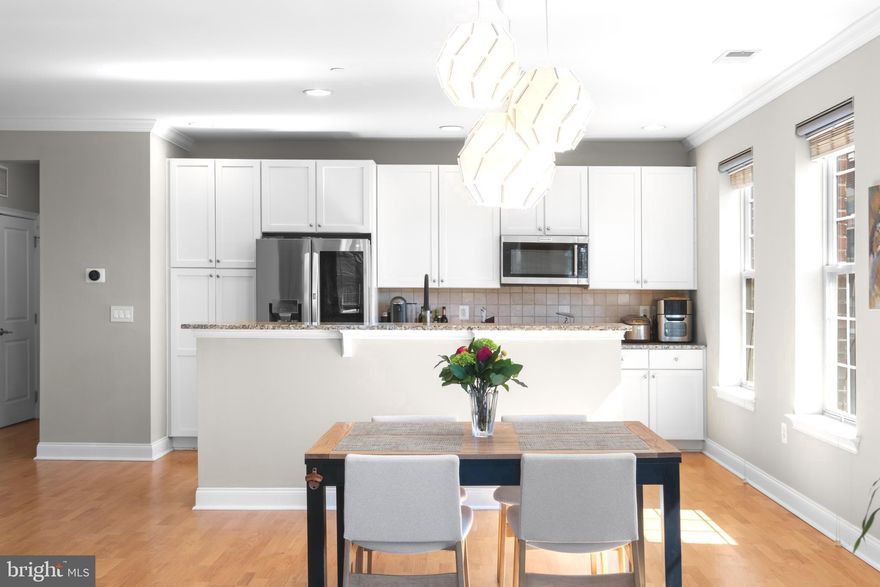 *Showings start Saturday 4/5 at the Open House 12-2pm*  Experience the pinnacle of luxury living at 600 Commodore Court #2640, a stunning condominium in Philadelphia’s prestigious Naval Square community! This rare and highly sought-after 2-bedroom, 2-bath corner unit offers both garage parking and a private storage locker for ultimate convenience. Situated on the third floor of the desirable Addison Manor, this home features beautiful southern exposure, filling the space with natural light all throughout the day. Step inside to find gleaming hardwood floors and an elegant entry foyer that leads to a gourmet kitchen. Designed for both style and functionality, the kitchen features a generous island with shaker-style cabinetry, a tumbled marble backsplash, granite countertops, and premium stainless steel appliances, including a newer counter depth LG refrigerator. The open-concept design seamlessly connects the kitchen to an expansive living and dining area—perfect for hosting and entertaining. Floor-to-ceiling Juliet balconies allow for a fantastic cross breeze and watching some of the most beautiful sunsets in all of Philadelphia! The tranquil primary suite is a true retreat, complete with an oversized walk-in closet including built-ins and a spa-like en-suite bath featuring dual sinks, a soaking tub, a separate stall shower, and luxurious granite and tile finishes. The well-appointed second bedroom offers versatility, making it ideal as a guest room, nursery, office, or den. A beautifully updated hall bath with Carrara marble and subway tile, along with a separate laundry closet housing a full-size side-by-side washer and dryer, completes the home. Additional conveniences include a spacious entryway coat closet and an exclusive 3’X6’X9’ storage locker within the building. The included garage parking space is conveniently located near the elevator, providing direct access from the garage level to your unit. Naval Square also offers ample visitor parking for guests. Enjoy the ease of having the pool & state-of-the-art fitness center directly across from your building and the concierge close by. The dramatic community room in the Biddle Hall rotunda is perfect to reserve for private parties. Enjoy the outdoor amenities of the 20-acre park-like setting: including picnic areas, well-kept gardens & mature landscaping. With a gated entry and on-site visitor parking, convenience and security are paramount. Very close proximity to South Street Bridge, UPenn (0.7 mi), CHOP, HUP & Drexel, Rittenhouse (0.9 mi) & Fitler Square. Fantastic restaurants and cafes, such as Rival Bros Coffee, Friday Saturday Sunday (James Beard Winner), Illata BYOB, Pub & Kitchen, Southgate, Sabrina's & Loco Pez, are all just steps outside the gates. The new Heirloom Market by Giant and South Square Market are only a block away. Directly out the back gate you will find easy access to the Schuylkill River Park, including the Award Winning Trail & Boardwalk, Markward playground, Tennis Courts & dog park! Naval Square is a pet friendly community allowing up to 2 pets with no weight restrictions. Don’t miss this rare opportunity to own a sophisticated, move-in-ready home in one of Philadelphia’s most coveted communities! There is a Special Assessment with approximately 9 months remaining. Preferred closing is the first week in July.