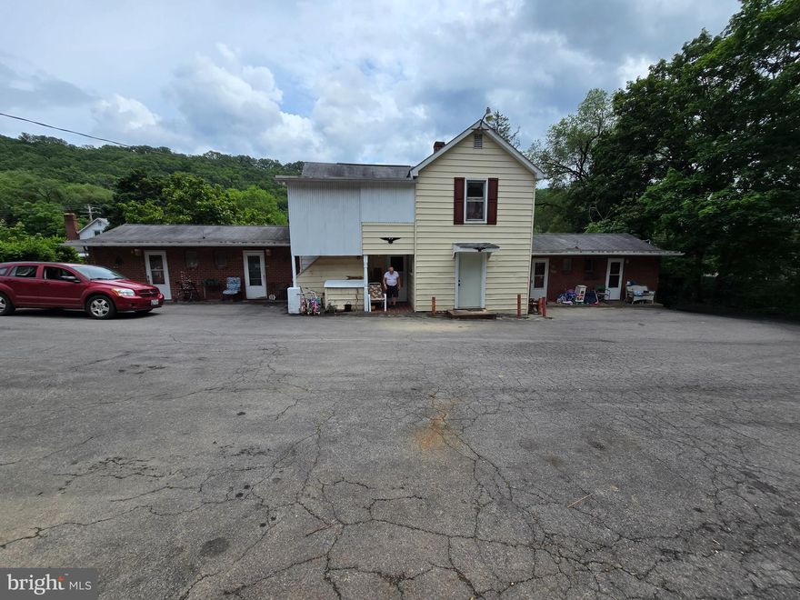 🏢 Investment Opportunity – 13-Unit Multifamily Property | 11903 Bedford Rd NW, Cumberland, MD 21502

Unlock the potential of this rare 13-unit multifamily investment opportunity located in the high-demand area of Bedford Road NW in Cumberland, Maryland. Strategically positioned just minutes from I-68 and key amenities, 11903 Bedford Rd offers a solid mix of unit sizes, consistent rental income, and long-term growth potential.

📍 Property Highlights:

13 Total Units – A mix of units from efficiencies to 2 bedroom units

Occupancy – High occupancy with strong rental history

Updated Systems – Many units feature updated kitchens, baths, and major systems

Parking – On-site parking available for tenants

Lot Size – Spacious lot with potential for additional improvements or amenities

Location – Convenient access to retail, dining, and major highways

💼 Investment Appeal:
This multifamily property presents a turnkey opportunity for investors seeking reliable cash flow and property appreciation. With room for value-add upgrades, new ownership can enhance returns even further. Proximity to Frostburg State University, local employers, and downtown Cumberland makes it an ideal rental location.

Don’t miss your chance to own a multi-unit property in a strong rental market. Whether you’re expanding your portfolio or entering multifamily investments, 11903 Bedford Rd offers both stability and upside.