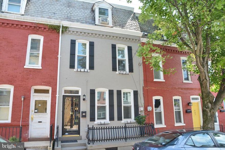 Beautifully updated, contemporary city home w/ 4 spacious bedrooms including large master suite w/ subway tiled shower and solid granite vanity. Exposed brick walls welcome you and the refinished softwood plank floors are common throughout! All appliances are included with the ''Chef's'' kitchen! Large Master Suite is a feature of the second floor. The Master bath has solid granite vanity & subway tiled shower! Large WIC or Bedroom 2 and the guest bath live here too. Third floor contain bedrooms 3 & 4.