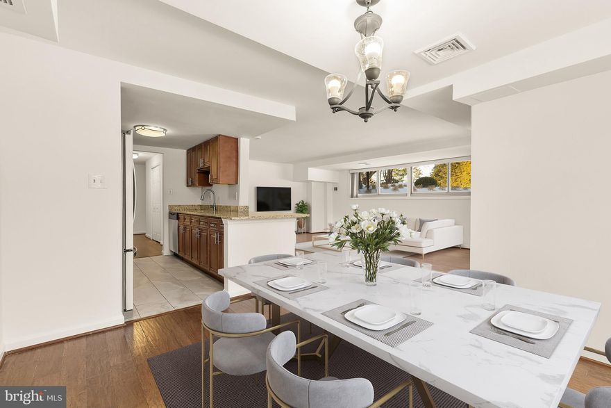 Welcome to the best of the best in this highly sought-after cooperative, perfectly situated in one of the area’s most beautiful and prestigious neighborhoods—celebrated for its breathtaking cherry blossoms and vibrant surroundings. This exceptionally spacious 1,300-square-foot, two-bedroom, two-full-bath residence delivers outstanding value at an unbeatable price in an unbeatable location.
Flooded with natural light, the home has been freshly painted throughout and showcases gleaming wide-plank hardwood floors, a generous open living area, and a dedicated dining room ideal for both everyday living and entertaining. The beautifully updated kitchen features stainless steel appliances, granite countertops, updated cabinetry with soft-close drawers, and a convenient breakfast bar. A high-quality in-unit dehumidifier enhances year-round comfort and efficiency.
Both bedrooms offer impressively large closets, with the primary suite featuring three spacious closets, providing exceptional storage rarely found in comparable residences. An additional private storage cage further enhances convenience and organization.
Step through sliding glass doors onto a large private terrace overlooking tranquil garden views, with direct access to the Crescent Trail—an exceptional and rare extension of your living space. Two parking spaces convey, including one garage space and one surface space, an extraordinary bonus in this prime location. The unit is ideally positioned on the same level, just steps from the newly renovated laundry facility.
Enjoy effortless walkability to shops, grocery stores, restaurants, Metro, and public transportation. With abundant space, natural light, generous storage, modern updates, private outdoor living, parking, and a premier location, this remarkable residence truly has it all.