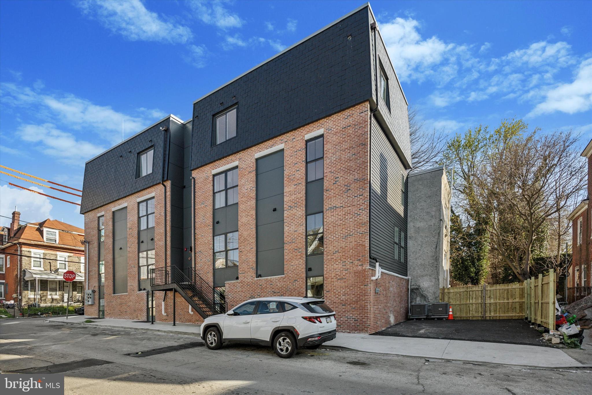 Welcome to this exceptional BRAND NEW four-unit building, offering a unique blend of style, modern convenience. This listing is a bi-level on the first and second floor. Each of the four units is a rare 24 feet wide, open concept living and kitchen area, creating a sense of airy, welcoming space where your design aspirations can truly shine. The heart of the kitchen is the large, elegant stone island countertop, providing both a functional workspace and a gathering point for family and friends. All spaces have in-unit washer and dryer making laundry day a breeze, and huge walk-in closets and double vanities. Enjoy an abundance of natural light that filters through large windows, filling each unit with a warm and inviting ambiance. Wide-planked engineered oak hardwood floors add a touch of sophistication, and the modern kitchen cabinets are not only sleek but also offer ample storage, making daily life a breeze. Kitchens are equipped with separate pantry, under-cabinet trash storage and counter-depth refrigerators for efficient use of space. For those seeking extra flair and a taste of the high life, the two-bedroom, two-bath units offer something truly special. Outside, you'll find a private driveway, providing secure and convenient off-street parking for residents. With two parking spots available for rent, you'll never have to worry about finding a place to park, a true rarity in urban living. In addition to the stylish and practical features, this property's location offers the best of both worlds: a tranquil retreat and easy access to urban amenities. Don't miss your chance to be a part of this vibrant community. These apartments range in size from 1, 415 to 1, 726 square feet, ensuring that you have ample space to create your ideal living environment. Tour now and lock in your unit! Please inquire about pricing for the other units in the building. Schedule a showing today and experience the elegance, convenience, and opportunity that this unique building has to offer. Your dream home is waiting!