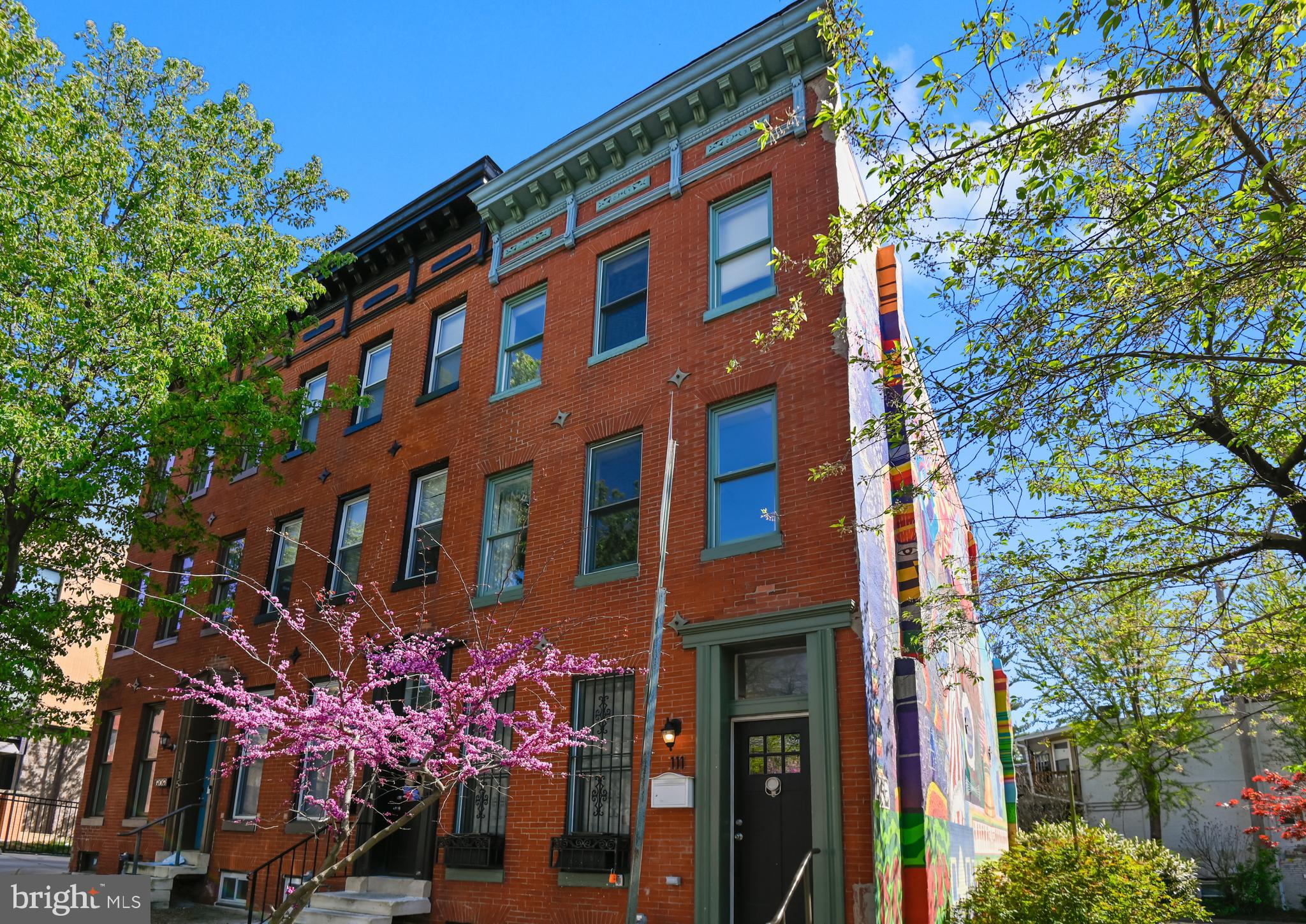 Escape the city bustle in this Urban Retreat in Station North Art District is this Brimming home with over 2,000 sf of warm livability. This vintage industrial renovation features environmentally-sensitive fireplaces, a recycled wood/iron staircase, Carrara marble counters & many custom features. Gorgeous and eco-friendly with your own private backyard and in a fantastic location next to a park! Walk to Penn Station, University of Baltimore Law School, and MICA. Schedule your tour today!
