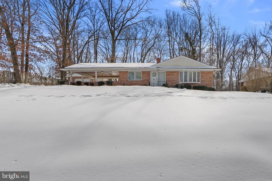 Welcome to your expansive 3,400+ square foot, 4 bedroom, 2.5 bath home nestled on over half an acre in beautiful Beltsville. Lovingly cared for and thoughtfully updated over the years, this move-in ready home offers the perfect blend of space, privacy, and modern convenience — all just 2 miles from I-495 and I-95. Tucked away on a quiet, tree-lined dead-end street, you’ll enjoy both privacy and accessibility. Inside, hardwood floors flow throughout much of the home, creating warmth and timeless appeal. The eat-in kitchen features granite countertops, gas cooking, and opens to comfortable living spaces perfect for everyday living and entertaining. Bathrooms have been tastefully updated, and the home has been meticulously maintained with quality improvements throughout.  
Major upgrades provide peace of mind, including: 200 amp electric heavy-up (2004),  30-year roof on both house and garage (2004), Siding (2005), HVAC system (2007), Whole house generator (2012), Electronic air cleaner (2015), Energy efficient Pella casement windows.  Additionally, car enthusiasts, hobbyists, or entrepreneurs will love the oversized detached garage measuring approximately 15’7” x 26’7” with tall ceilings — in addition to the attached 2-car carport. With over half an acre of land, adjacent to county park, no HOA, and a setting that feels private yet central, this is a rare opportunity to own a truly well-maintained home with space to grow.