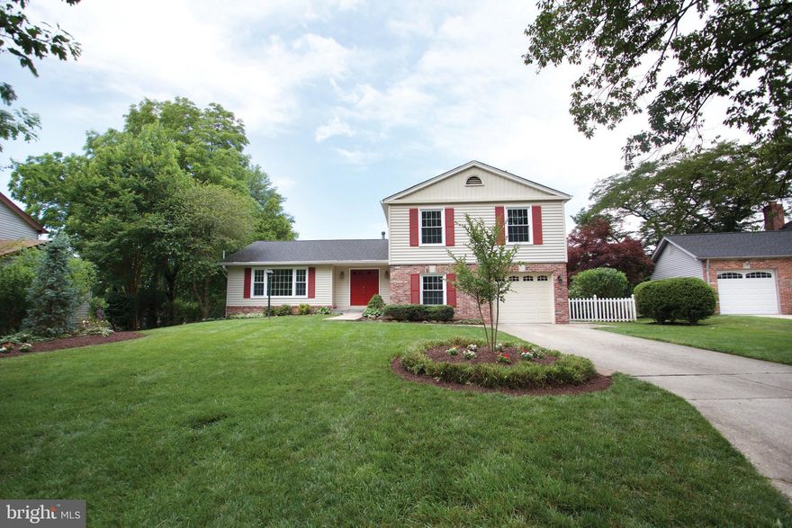 Open Sat 6/8 1-4pm & Sun 6/9 1-4pm. Sited on 1/5 acre lot, this spacious 7BR/3.5BA Colonial awaits your personal touches. The 2500+SF interior features a welcoming foyer; formal living and dining room; remarkably large eat-in kitchen with pantry; expansive family room with exposed brick fireplace; original hardwood floors throughout; chair railing; countless windows beaming lots of natural sunlight; mud room with full-size washer and dryer; main-level bedroom; and half bath. The upper level features 5 generously sized bedrooms including a grand master's suite with en-suite bath, separate shower and beauty vanity area. The lower level boasts an expansive finished, 1BR/1BA basement apartment with living/dining room area; ample storage space; and full kitchen with lots of counter space. This au pair, in-law suite gives full privacy and the opportunity to offset your mortgage payment. This home offers a private retreat away from the hustle and bustle of the city. You'll love entertaining guests in the serene backyard oasis featuring a covered patio; meticulous landscaping; a fish pond; tranquil walkway, bridge and storage shed. Complete with a one-car garage and a long paved driveway to accommodate multiple cars; this home has it all. Make an offer today!