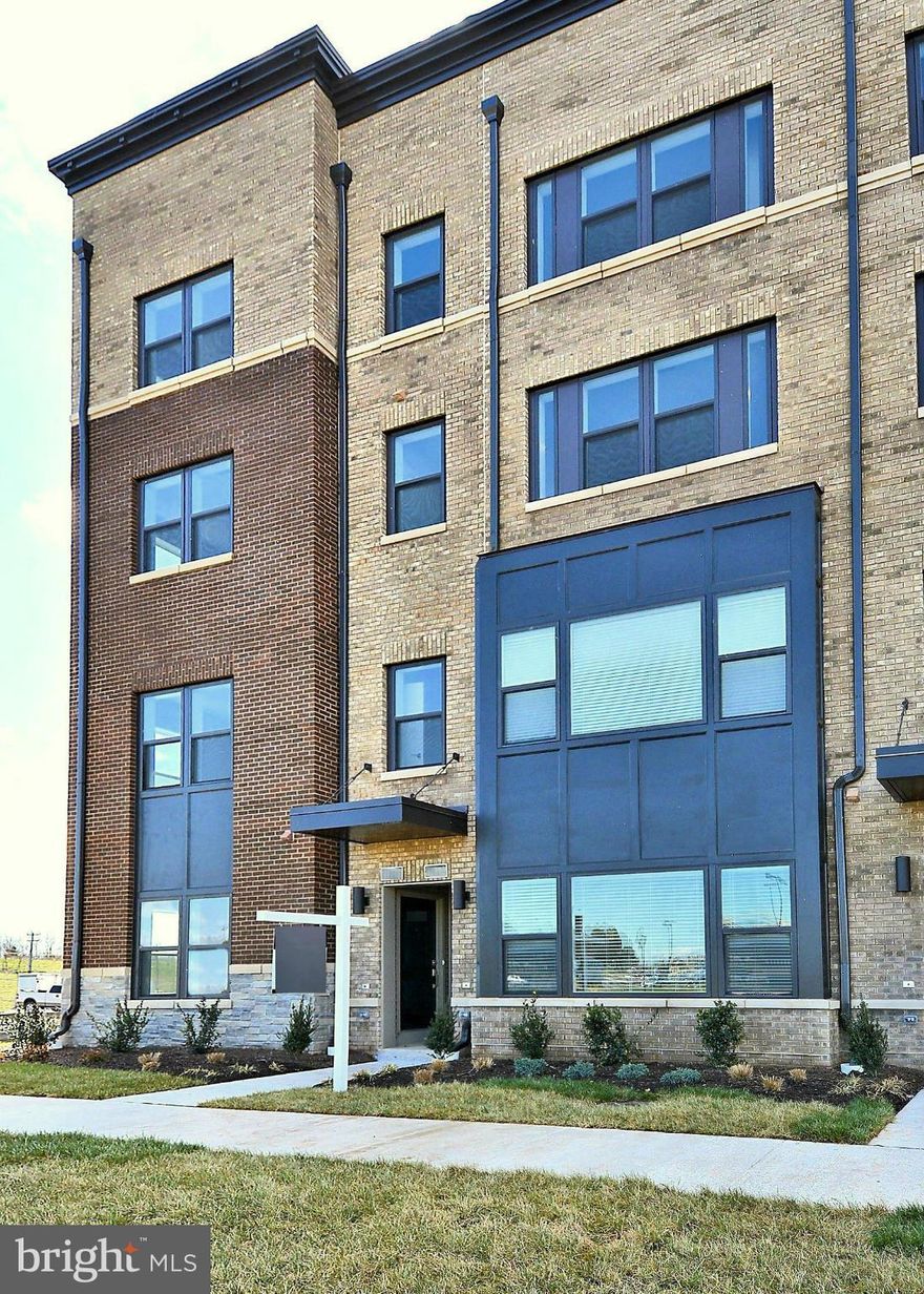 BRAND NEW! Never lived in 2 level townhome located directly across from One Loudoun Town Center.  Bright, sunny open floorplan w/ upgraded kitchen & wood floors on the entire main level.  3 SPACIOUS bedrooms upstairs w/ washer/dryer located on the bedroom level. Ceiling fans on all bedrooms. 2nd floor deck & 1-car garage convey. Walk to shops, restaurants & The Alamo theater!  *No pets or smokers*