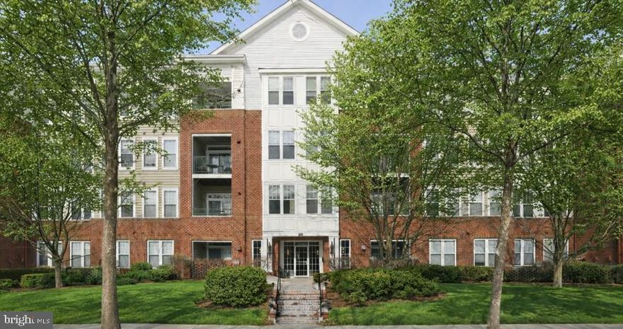 Spectacular 2 bedroom, 2 bath condominium in a secure elevator building located in the desirable King Farm neighborhood.  Freshly painted with brand new LVP flooring throughout.  This light filled condo is truly move in ready.  The fabulous Kitchen features a center island, an abundance of cabinetry for all of your spices, pots and pans.  A spacious eat in dining area; perfect for everyday living and entertaining.  The Living Room is ideal for hosting friends and family, and opens through a sliding glass door to a private balcony; the perfect spot for a morning cup of coffee.  The Primary Suite offers generous closet space and a private bathroom with a new glass enclosed shower.  The second bedroom is spacious with ample closet space and is ideal for guests or a home office, with a full bath conveniently located near by.  A full size washer and dryer are located inside the unit for added convenience.  Community amenities include, pool, fitness center, tennis courts, parks, jogging trail and scenic trails.  Situated close to shopping, dining and entertainment.  Minutes away from 270 and the ICC.  Enjoy one level living at it's best!!