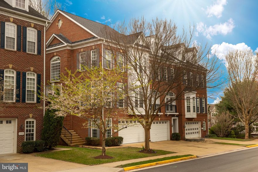 Welcome to this stately three-level townhome with a two-car garage, located in the highly desirable Fairfax Gateway neighborhood. Exquisitely maintained, the home features hardwood floors on two levels & no carpet throughout, complemented by 9+ foot ceilings, fresh neutral paint & an open, flowing layout designed for modern living.  The expansive living room &  formal dining room seamlessly connect to a spacious family room, breakfast nook & large kitchen at the rear. Unique architectural bump-outs on each level enhance the home’s bright & airy ambiance, with tall windows—many adorned with elegant wood plantation shutters—flood the interior with loads of natural light.  The family room also includes a lovely electric fireplace!   Upstairs, the impressively large master suite offers a generous walk-in closet, double vanity, soaking tub & walk-in shower. Two additional bedrooms, a well-appointed hall bathroom & a convenient upstairs laundry complete the upper level.  The lower level features custom built-ins, beautiful ceramic tile flooring & a versatile flex/sunroom that opens to a private backyard overlooking common land & mature trees. Enjoy the convenience of NO LAWN CARE as your HOA take care of all that!  Additional highlights include dual-zone HVAC & a double-car garage with extra storage.  Ideally situated within walking distance of George Mason University & close to historic downtown Fairfax, this home offers convenient access to major commuter routes including the #123, Braddock Road & the #66 Freeway. Also this lovely Townhome is located in the highly desirable Woodson Highschool pyramid which includes, Frost Middle School & Oak View Elementary! Don’t delay in viewing this stunning place!