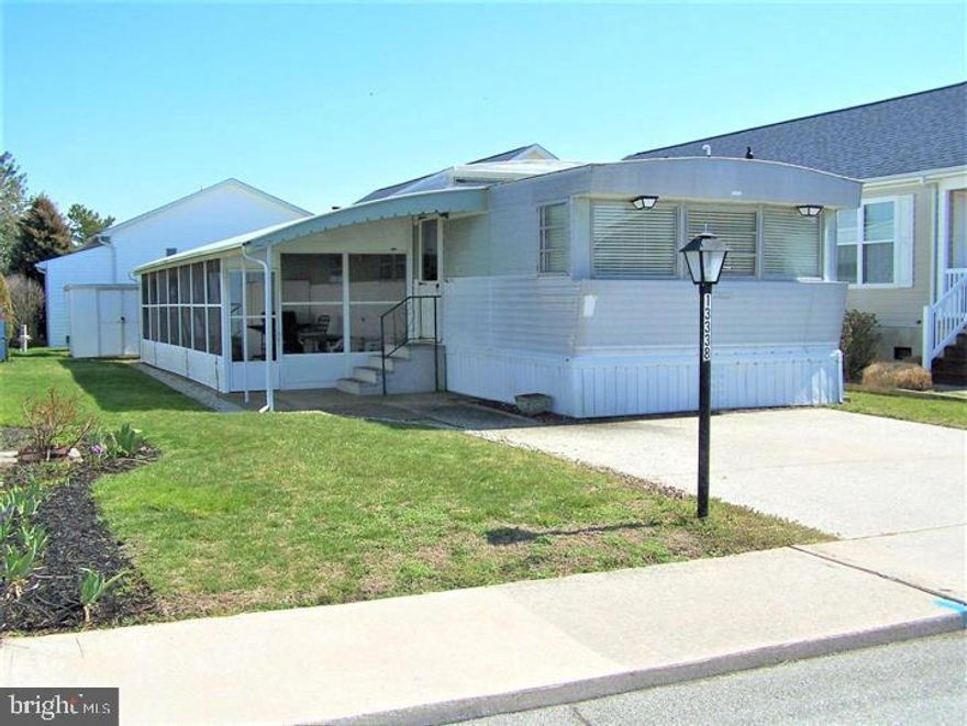 Look no further!! Never been rented, only 2 owners, fully furnished and ready for your 2023 summer vacation. Owner will even include the beach chairs and umbrellas if the buyer wants them! Walk to the beach from this 3 bed 2 bath home, located in the sought after community of Montego Bay in North Ocean City, MD. Featuring updated kitchen cabinets, counters and appliances, vinyl laminate flooring in the living area, berber carpeting in bedrooms, built-in stereo system with ceiling speakers in multiple rooms (with 8-track for vintage enthusiasts), full-size laundry and more. Outside you will find a large Silvertop screened porch with additional storage, large storage shed, and an outside shower. Community amenities include dusk-to-dawn street lights for enjoyable evening strolls, 2 in-ground swimming pools (including a separate kiddie pool area), 2 tennis courts, a shuffleboard court, a 9-hole mini-golf course, a bayfront boardwalk with 3 fishing/crabbing piers, an 8-acre wildlife sanctuary/park area, with a large pond and blacktop walking/jogging trail, and a community crabbing/fishing area...all for a low annual HOA fee of $396.00!!