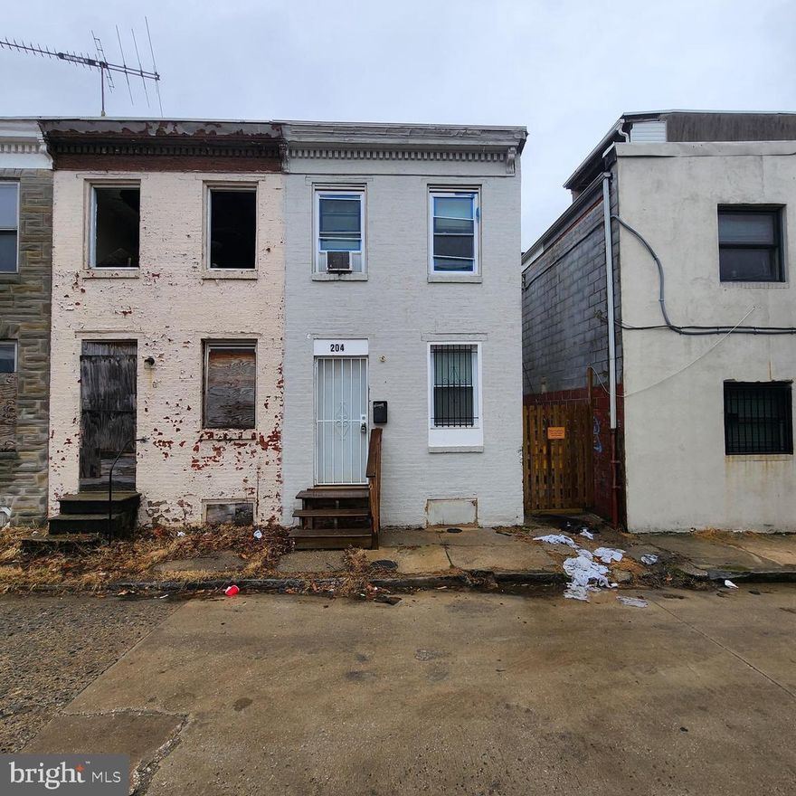Investor opportunity in Baltimore City’s Mount Clare neighborhood with strong upside potential. This 2-bedroom, 1-bath townhome offers a full renovation opportunity for buyers looking to customize and add value. Property requires significant rehab, including a new roof, and is being sold strictly as-is. Surrounded by renovated comparable properties, this home presents an excellent opportunity for a resale project or long-term investment. Conveniently located with access to major commuter routes, downtown Baltimore, and local amenities. Cash or hard money only. No interior access—property being sold sight unseen. Walkthrough videos available upon request.