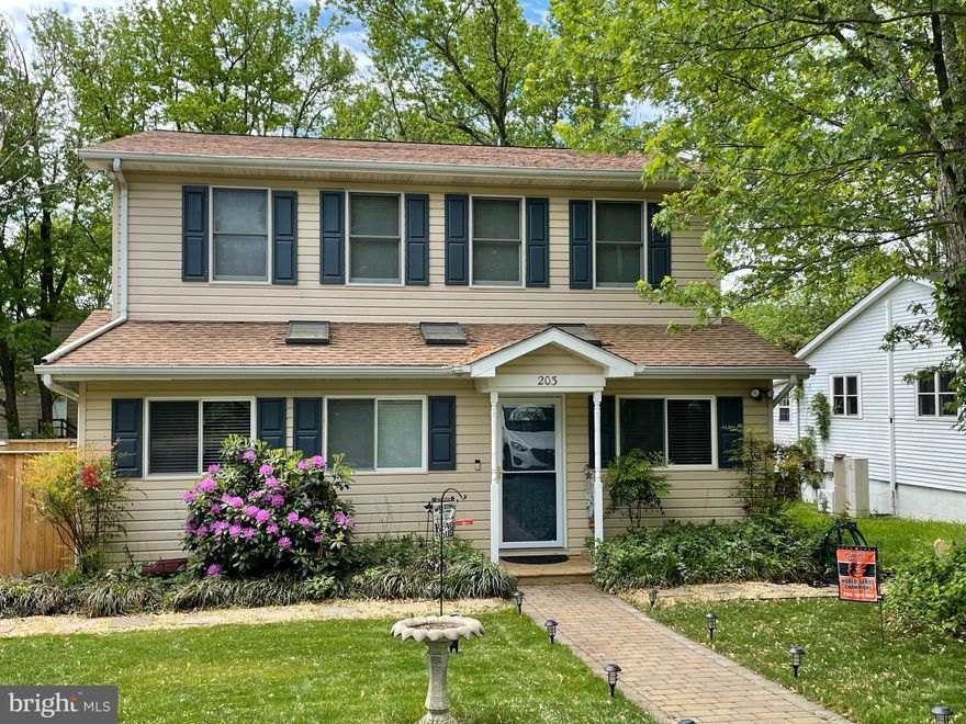 Beverley Beach!!  Blocks away from the Chesapeake Bay!  Just steps to Triton Beach Park and miles of walking trails. Current owners have upgraded every inch of this charming 4 bedroom, 3 bath home. Move in ready! A light and airy sunroom greets you as you enter the home.  Numerous windows and 3 skylights make this the perfect spot to create a home office or cozy reading nook.  In the family room, the heart of the house, notice the 4 inch scraped maple floors, neutral paint and  wood wall accent.  Off the family room you will find the updated kitchen with newer stainless steel appliances, quartz countertops, tile backsplash, white cabinets,  large pantry and access to the deck and backyard.   There is full bath as well as an additional bedroom on the first floor.  On the second level you will find a the spacious owners suite with walk in closet and updated en-suite bath to include double vanity, large soaking tub and shower stall.  Additional 2 bedrooms, completely updated full bath and washer and dryer are also located on the second floor.  There is an attic for storage with a wood floor and additional storage space under the stairs that can be accessed from the sunroom.  New roof, hot water heater, lighting throughout, sump pump and heat pump were all replaced in 2020.  Fresh paint, newer wood blinds and flooring throughout.  New back door, front door and storm door.  Fully fenced in yard with privacy fence and storage shed.  Large back deck perfect for family cookouts and crab feasts! Cool off on those hot summer days in your above ground pool.  Enjoy walks or bike rides to the sandy beach and playground that over looks the bay.  Lace up your shoes and hit the trails!  Several ponds located in the park perfect for fishing and kayaking.  Blue ribbon schools! Vacation where you live... and make this your new home.