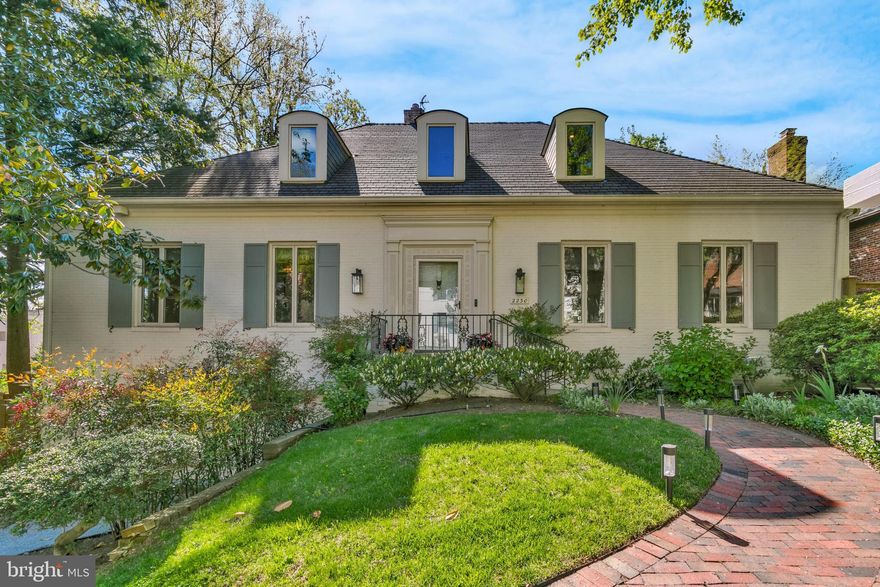 Introducing Fox Burrow, an exquisite abode nestled in the heart of Berkley, boasting unparalleled access to bustling Georgetown, major airports, and the serene countrysides of Virginia and Maryland. Fox Burrow is designed to accommodate a variety of lifestyles, offering two primary suites—one on the main level—along with three additional bedrooms, four full bathrooms, and two half baths. Natural light floods the interior, creating a warm and welcoming atmosphere, with easy access to the terrace from both the living room and dining room. The property includes two dedicated home offices, one with an independent entrance ideal for a private practice, a two-car garage, and a secluded garden with potential space for a pool, making this home truly remarkable.
This magnificent residence underwent two years of meticulous renovations, completed in 2021, under the creative vision of Laure Vincent-Bouleau, a designer with French roots, infusing the home with a unique blend of character and elegance. The renovation showcases a commitment to quality and style, evident in features like the elegant porcelain wall in the upper level owner’s suite bathroom and the  white oak hardwood floors that grace both the floors and stairs. 
Every detail in Fox Burrow has been carefully curated, from custom tile flooring and cast iron HVAC registers to Emtek door hardware and premium Waterworks fixtures.  The expansive living room, with its inviting fireplace, towering ceilings, and captivating views of the garden, serves as the heart of the home. The modern kitchen, illuminated by natural light, is sumptuously appointed and includes a cozy breakfast nook and opens to both the dining area and a secluded terrace overlooking the bak yard, perfect for entertaining or tranquil relaxation.