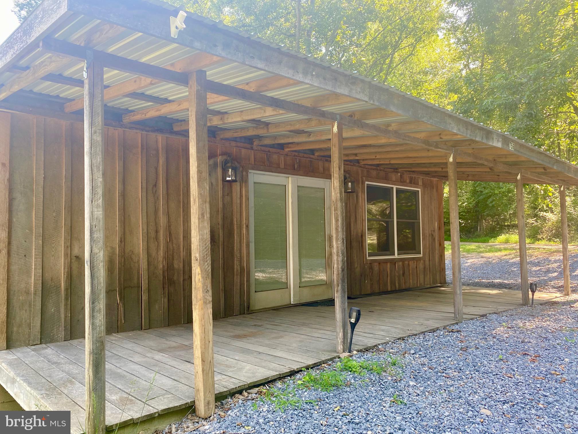 This cabin offers a delightful front porch with peaceful views. There is a woodstove and electric heat. Past tenant had Frontier for internet. The owner will consider pets.