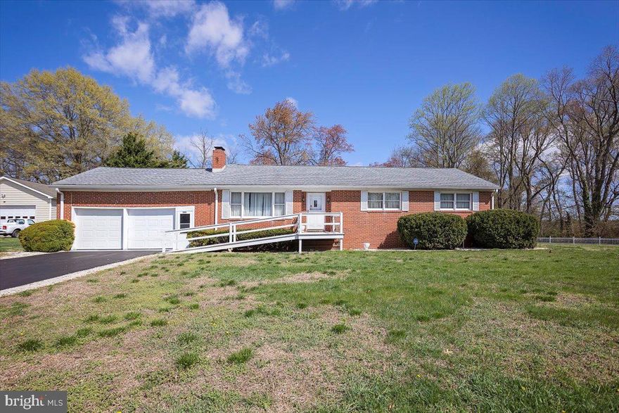 Welcome to this beautifully maintained 3 bedroom, 2 bathroom home, proudly built and lived in by the original owner. Situated on 2 peaceful acres within the town limits of Sudlersville, this property offers the perfect blend of in-town convenience and country charm. Inside, you'll find a warm and inviting layout featuring two fireplaces that add character and comfort to the living spaces. The home includes a spacious partially finished basement, ideal for extra living space, a home gym, or your dream rec room with the right touch. The kitchen includes a handy trash compactor, and the entire home is backed by a whole-house generator to keep you comfortable no matter the weather. There's a two-car garage attached as well as a detached garage with electric along with a carport—great for a car or extra storage.  Located just minutes from Route 301, this home is perfectly positioned for an easy commute while offering all the peace and privacy you’ve been searching for.
