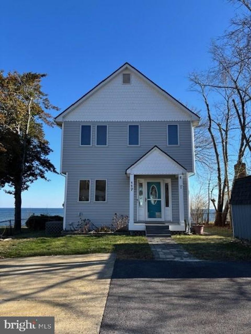 PRISTINE WATER FRONT HOME WITH BREATHTAKING VIEWS OF THE CHESAPEAKE BAY AND PRIVATE BEACH ACCESS. THIS HOME HAS IT ALL AND YOU WILL FEEL LIKE YOU  ARE ON VACATION EVERY DAY! STUNNING HARDWOOD FLOORS AND OPEN CONCEPT LIVING ROOM AND KITCHEN OVERLOOKING THE GLEAMING WATERS OF THE CHESAPEAKE. THREE WELL APPOINTED BEDROOMS AND 2. 5 BATHS ALONG WITH SEPARATE LAUNDRY ROOM. PRIMARY BEDROOM FEATURES WALK IN CLOSET AND SUPER BATH WITH SOAKING TUB. WATER SIDE OF HOME OFFERS HUGE DECK FOR ENJOYING THE SCENERY. YOU WILL NOT WANT TO MISS THIS ONE!