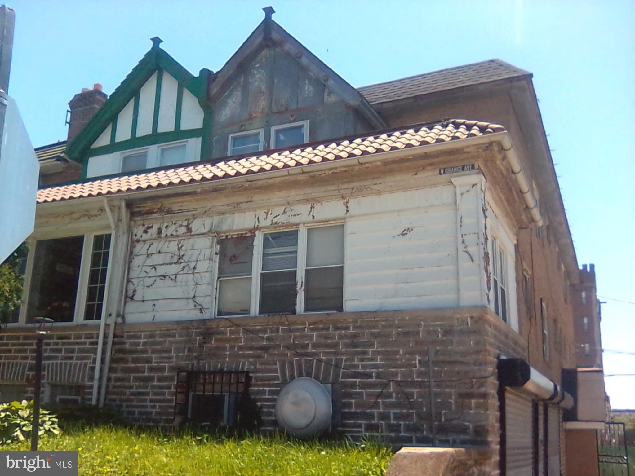 Calling all investors with vision and desire. 1450 W. Grange is located one block from Broad Street and across the Street from new construction properties. In this properties previous life the 1st floor portion of it was once used as the neighborhood convenience store and there was multiple apartments on the two floors above. The current condition presents an open canvas to allow your creative juices to flow and turn this property into whatever you desire. The buyer will be responsible for verifying that the zoning meets their specific desires for the property. The convenience store area located on the first floor Street level still has the deli counter, refrigerators and shelving items inside. The upper floors are completely open and ready for fresh ideas. The owner has purchased windows but never installed them. They will be left and included in the sale. Bring your creative mind and imagination and bring additional glory to this upcoming and changing area. The buyer will be responsible for obtaining the U&O. The owner is selling this property As-Is, Where-Is and will not make any repairs. Photos of the main level convenience store and additional photos will be added soon.