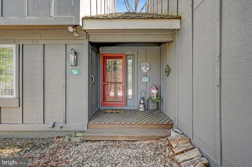 *PROPERTY IS UNDER CONTRACT AND ACCECEPTING SHOWINGS/BACK UP OFFERS AT THIS TIME**  Welcome to 56 Downhill, Snow Ridge Village—a beautifully updated 2-bedroom, 1.5-bath townhome perfectly situated at the end of a cul-de-sac for ultimate privacy and convenience. This prime location places you closest to the Jack Frost Mountain slopes, making it a dream spot for winter sports enthusiasts. From your rear deck, enjoy peaceful wooded views, creating a serene mountain escape year-round.  Step inside to discover modern upgrades that make this home move-in ready. Updates include: efficient ductless mini-split system for year-round comfort,  gorgeous quartz countertops in the kitchen,  newly renovated main bathroom featuring a stylish walk-in shower,  durable and stylish vinyl plank flooring throughout.  As the seasons change, this home is perfectly positioned for year-round fun in the Poconos. Snow Ridge Village offers the opportunity to join Big Boulder Lake Club, where you can enjoy swimming, boating, fishing, and an outdoor pool—perfect for summer relaxation!  Looking for an investment property? Short-term rentals are welcome in Snow Ridge Village, making this an excellent option for vacation rental income or your own peaceful mountain retreat.  Don’t miss this opportunity to own a slice of Pocono paradise! Schedule your showing today.