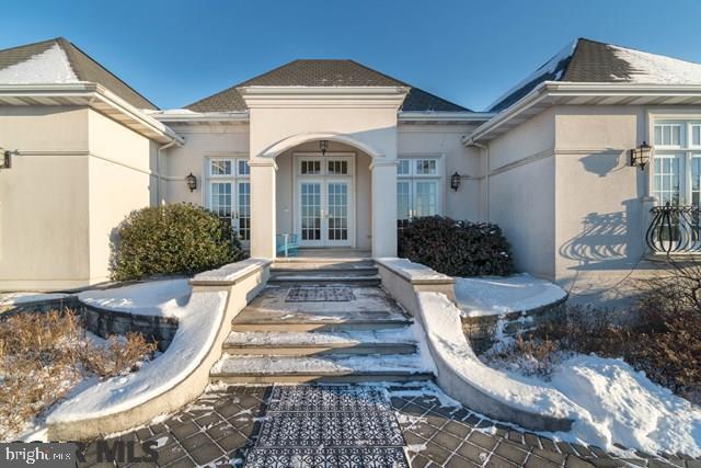 An incredible ranch built to the highest standard by Phil Bosak on a corner lot of 1.23 acres. The front affords gorgeous views looking toward Beaver Stadium and the rear has very pretty views of Tussey Mt. This home is simply incredible with extra high ceilings, graceful archways, ornate wrought iron accents and lots of windows to let in light. Each of the 4 large bedrooms has a private full bath (2 bedrooms on main floor/2 bedrooms in lower level). The grand Dining Room is huge w/ approx. 14' recessed ceiling & a sparkling chandelier. An extraordinary, large kitchen w/ double ovens & built in wok on gas stove looks to a huge Family Room. GREAT space w/ 4200+ above grade & approximately 2,000 below grade finished. Two-2 car garages (total 4 bays) and a private courtyard in the rear of the home. Laundry on both floors. It is an exceptional home for entertaining. Must see pictures because this brief description cannot convey the beauty.