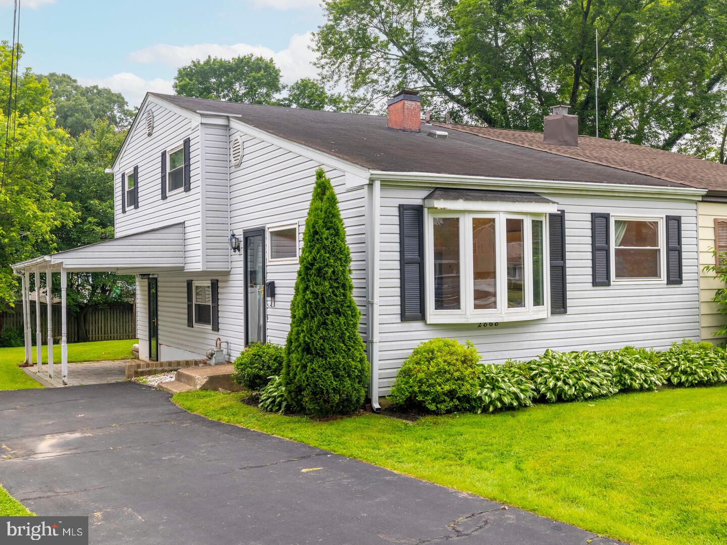 Great opportunity - Charming Twin in Roslyn! Enter to the bright, open living room with bay window and hardwood floors. The adjacent dining room and eat-in kitchen complete the main level. Step down to the family room with access to the side patio, a perfect space to relax with family and friends. A half bath, laundry area and storage room with built-in cabinets and shelving are also on the lower level. Three bedrooms and a full bath are on the second floor. Nice backyard with a storage shed is an added feature. Ready for your updates and personal touch, this property is priced to sell. Convenient location; close to schools, parks, shopping and restaurants. Abington Blue Ribbon Schools! Schedule your showing today!